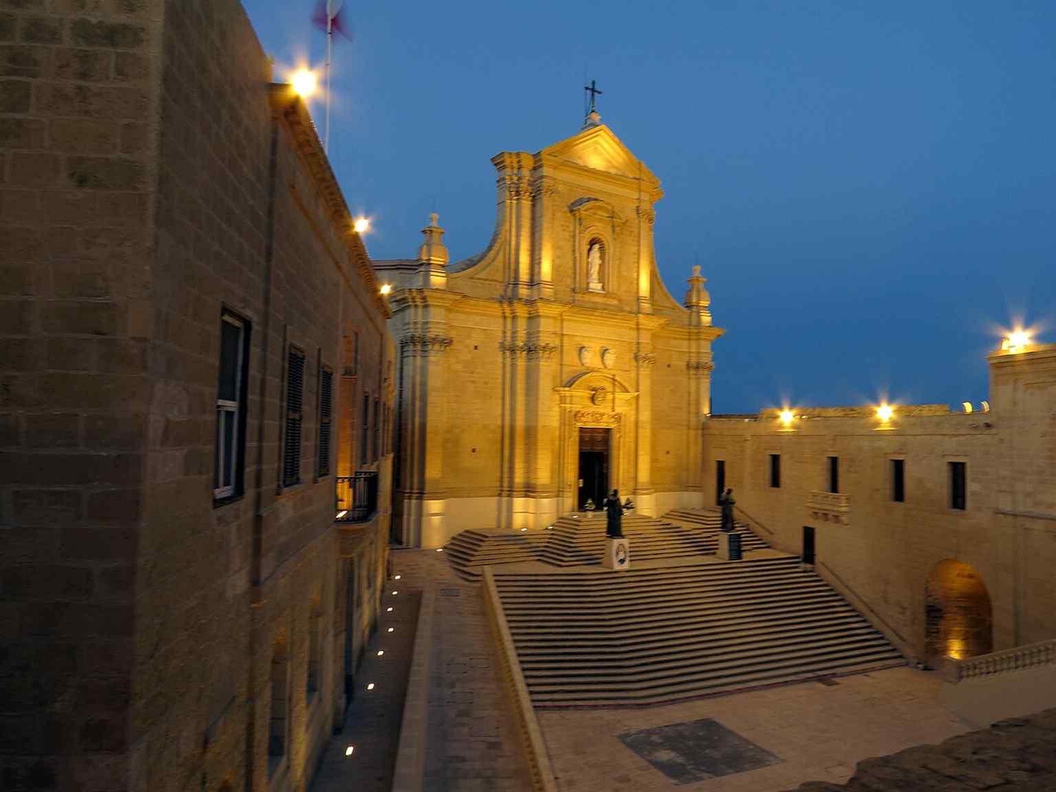 The cathedral façade in full daylight, a clear reference image for the island’s cathedral dedicated to the Assumption of Mary.