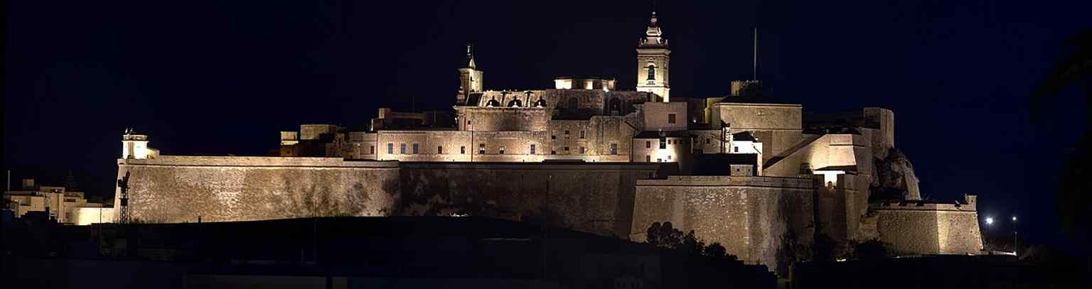 A sweeping high viewpoint of the Cittadella, useful for showing the cathedral’s commanding position within Gozo’s historic fortress.