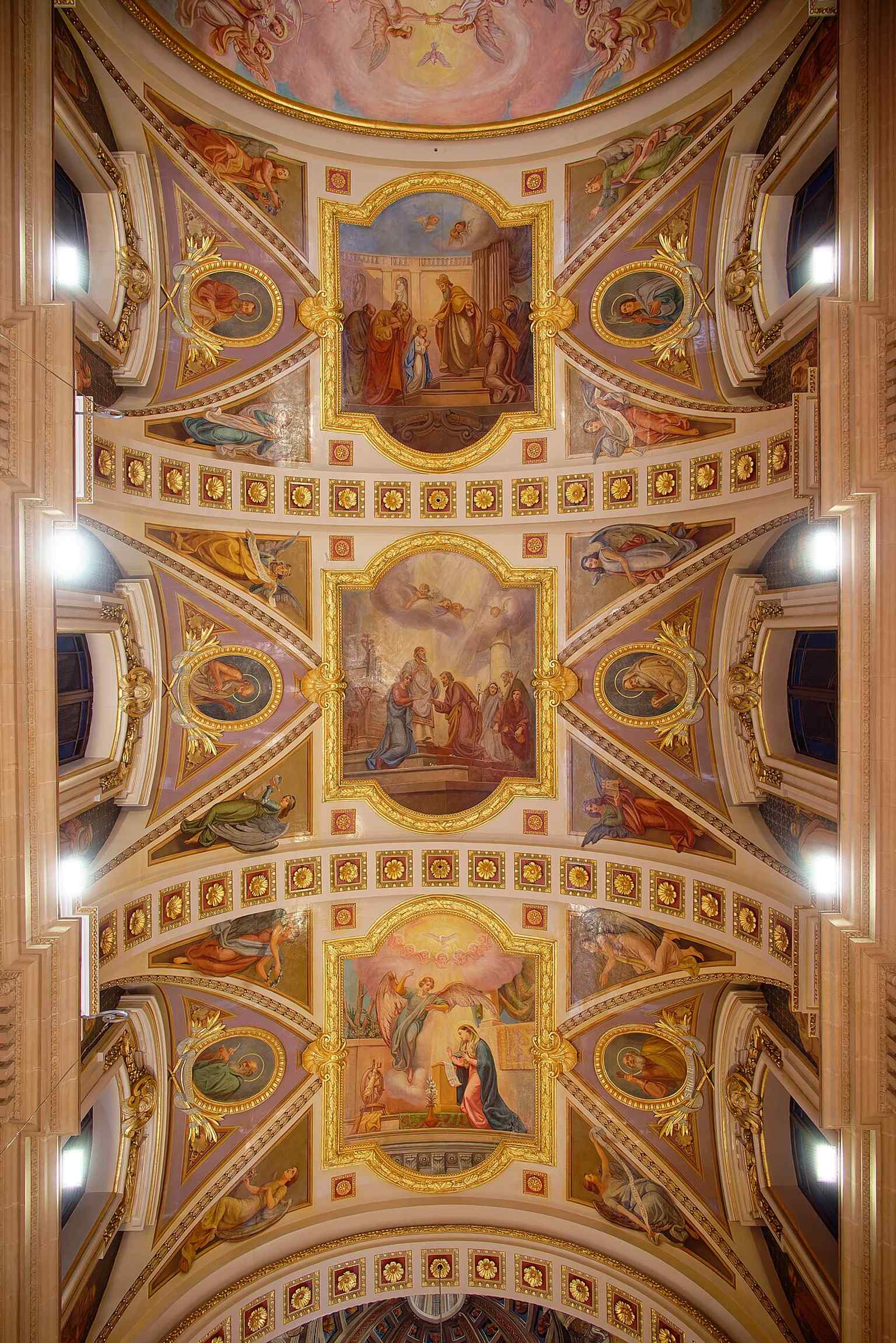 A close look at the painted ceiling that created the cathedral’s famous dome illusion, one of Gozo’s best-known Baroque tricks.