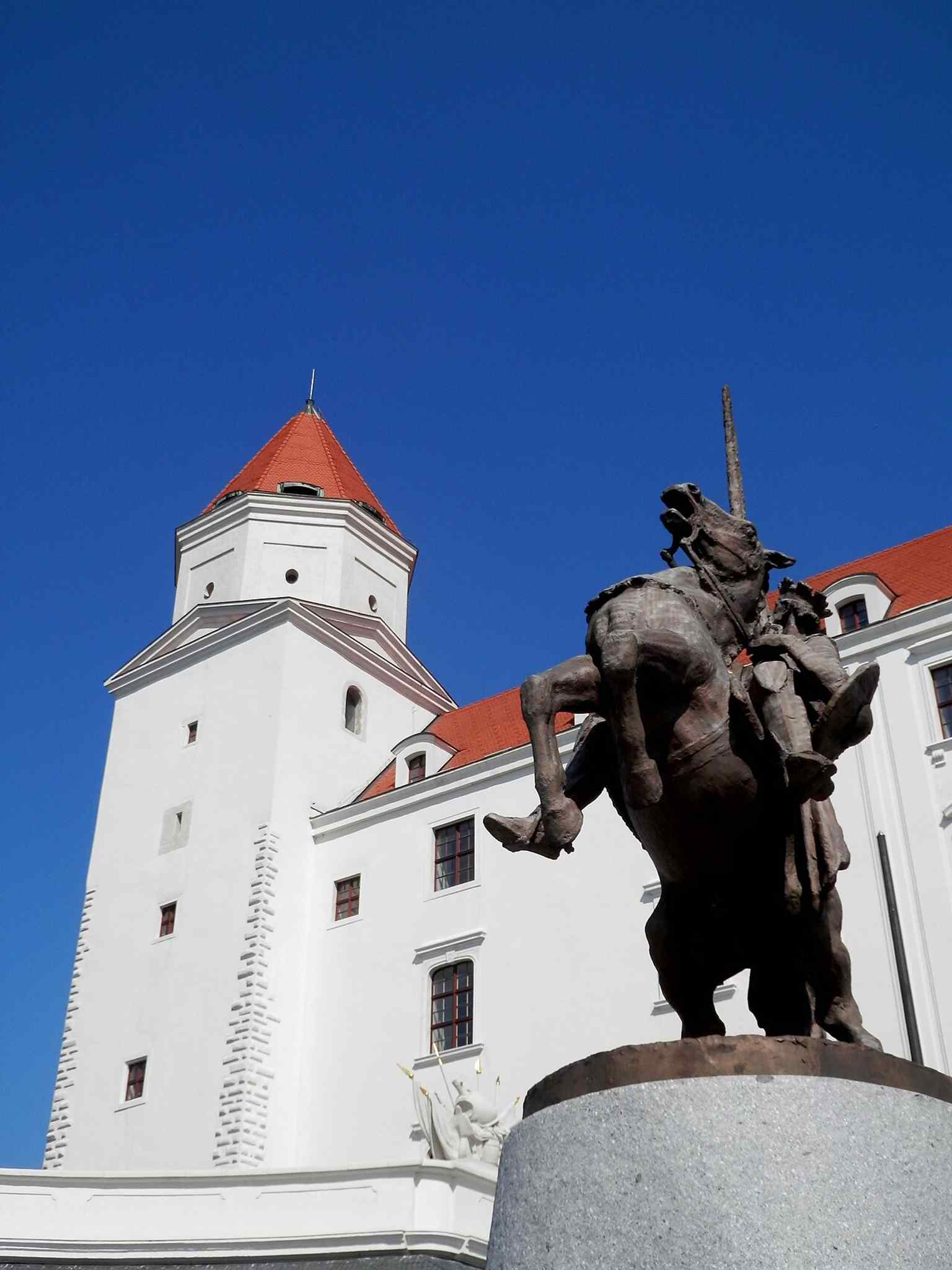 The statue of Svatopluk I on the castle grounds, linking the hilltop site to the Great Moravian roots of Bratislava Castle.