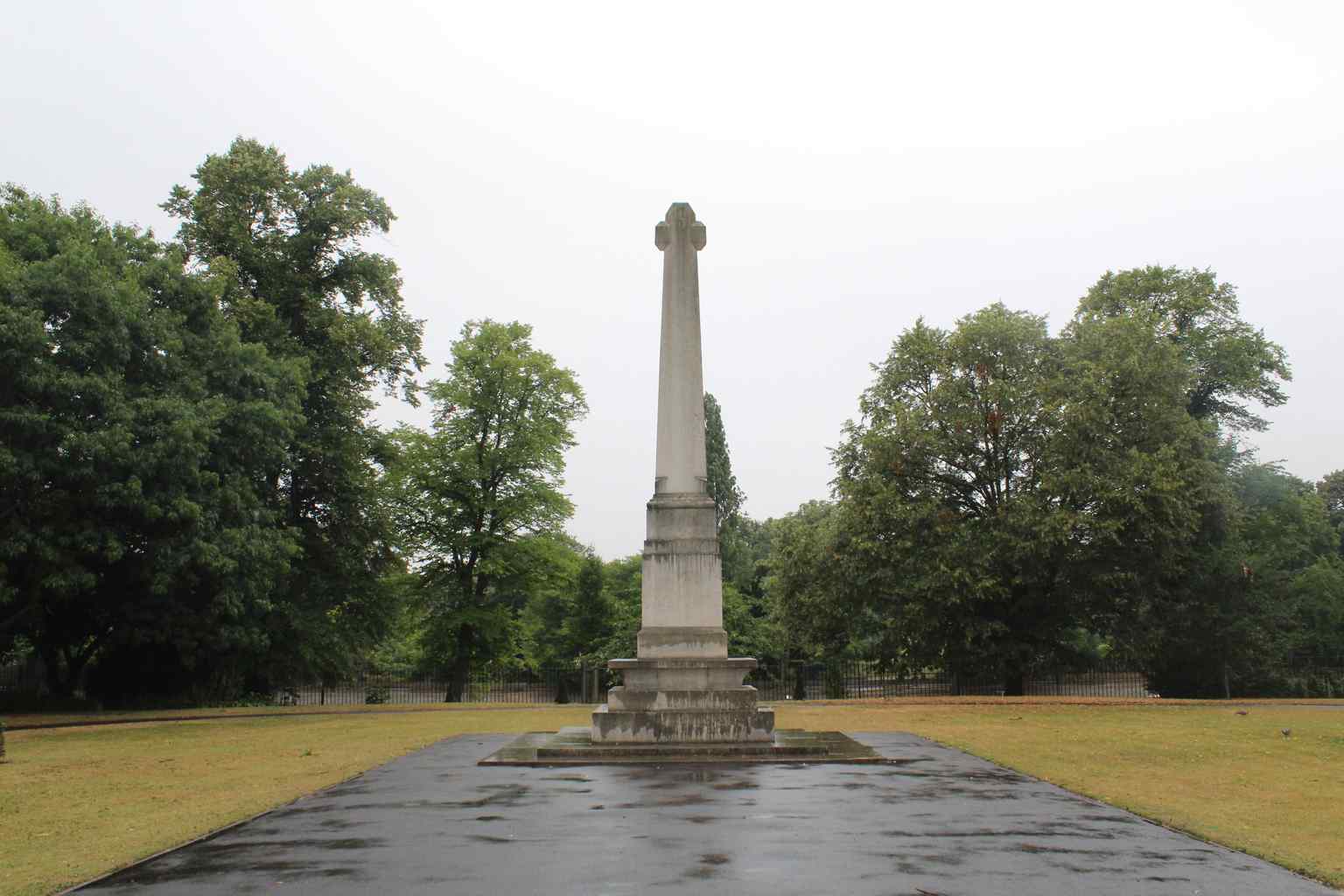 The stone base of the solitary War Cross within the peaceful Memorial Gardens, which secretly houses a 1925 time capsule (2018).