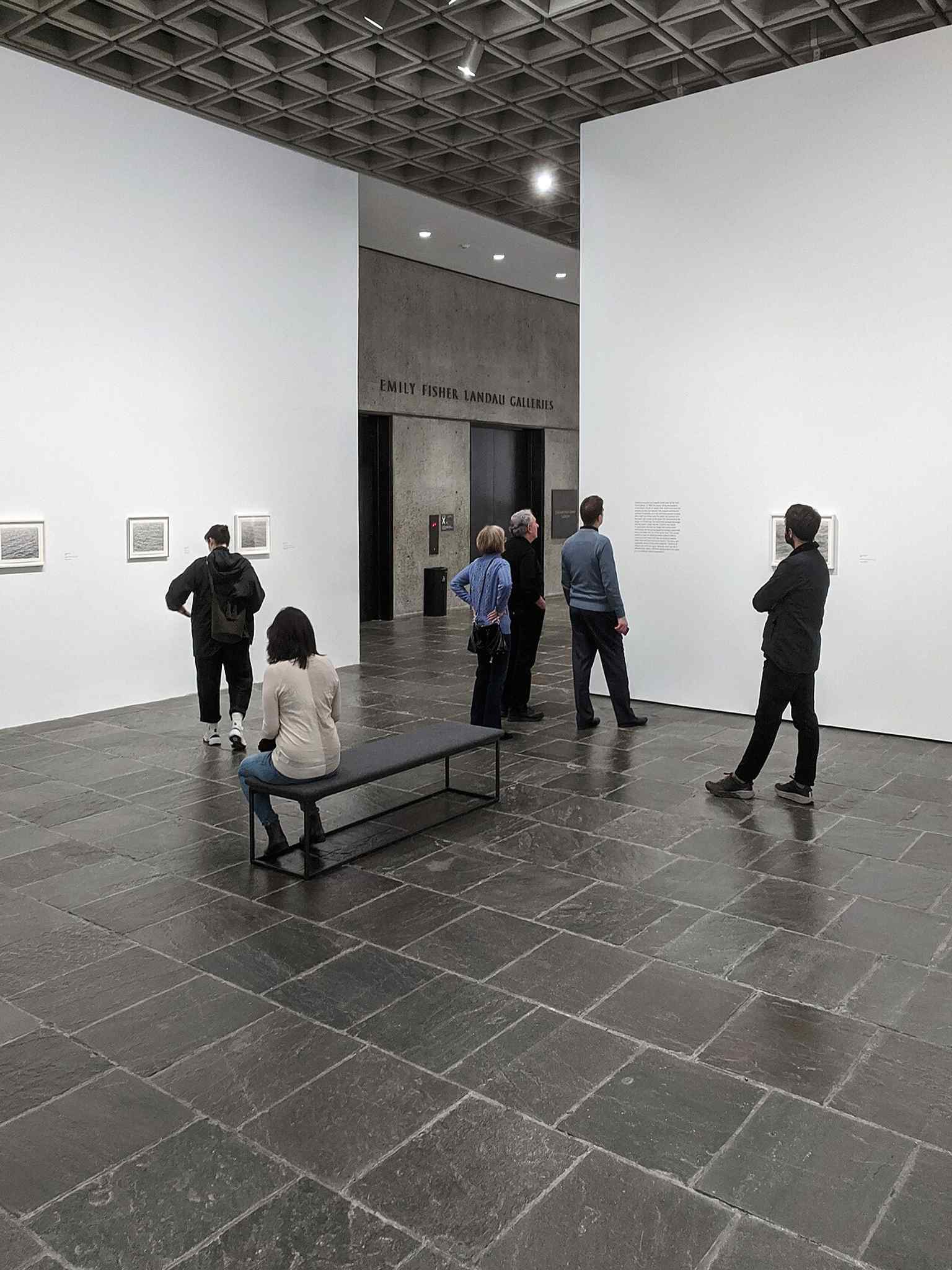 An interior view of the Met Breuer's 4th floor in its final year, reflecting architect Marcel Breuer's intention to create a "monastic sense of interiority" to focus visitors on the art.