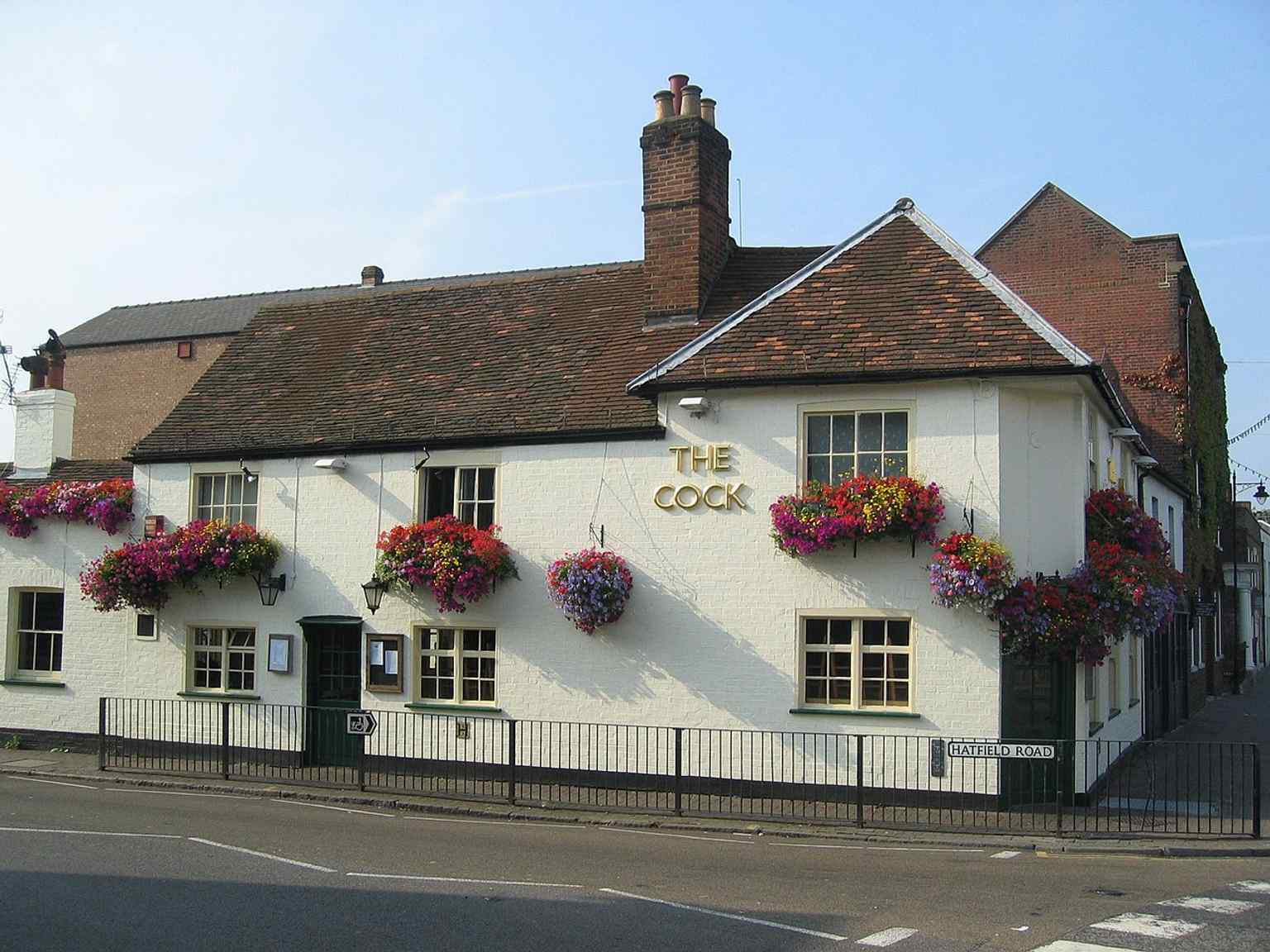 The Cock on the corner of St Peter’s Street and Hatfield Road — the pub that gave Cock Lane its name and became a local landmark.