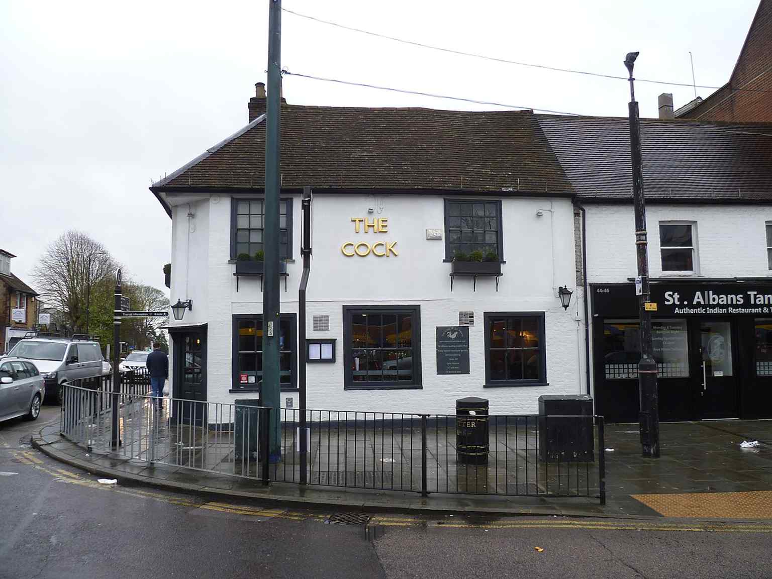 A later view of the same historic pub, still trading in the city centre where locals once came to drink and market-goers stopped by.