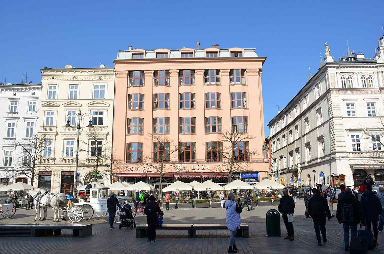 A recent street-level view showing how Feniks still anchors the corner of Kraków’s Old Town today.
