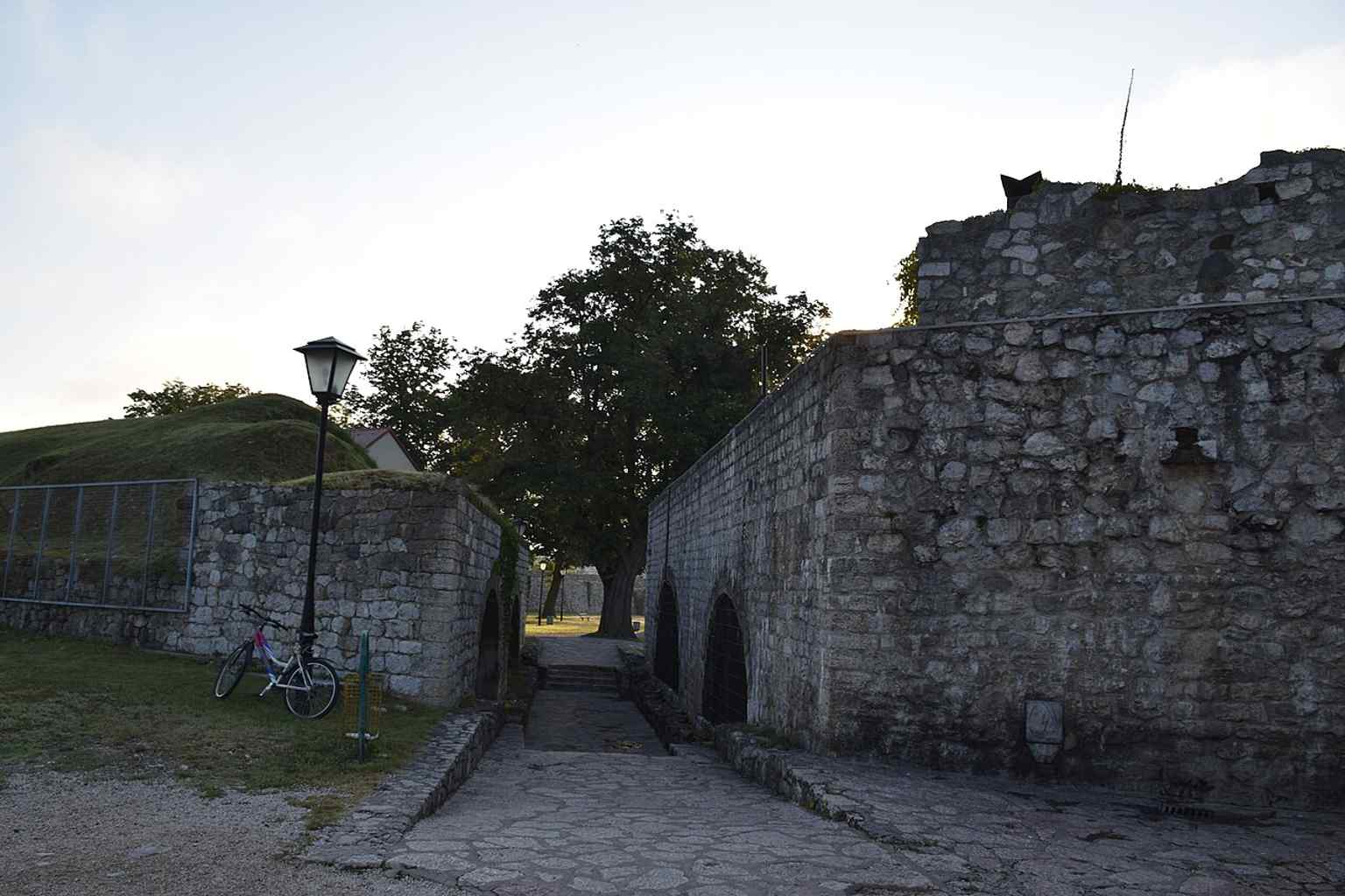An exterior shot showcasing the extensive walls and polygonal foundation of the Kastel Fortress, which was expanded to its final dimensions during the restoration by Köprülüzade Numan Pasha.