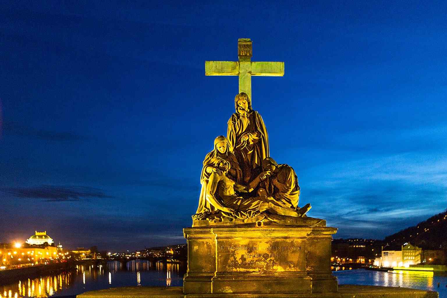 This daytime view showcases the restrained, Neoclassic style of Emanuel Max's sculpture, a deliberate contrast to the dramatic Baroque energy of its predecessor.