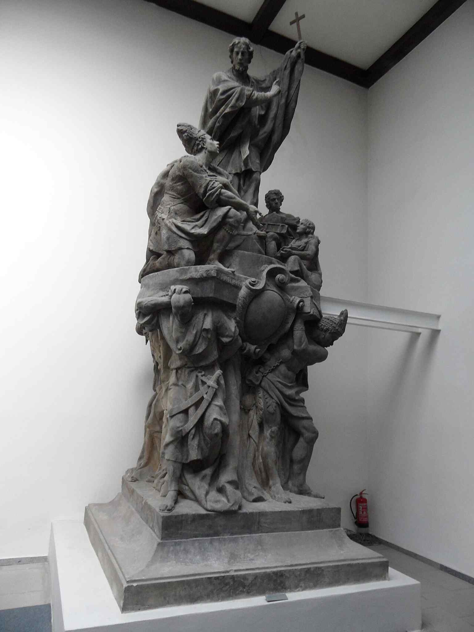 Fragments of the original sandstone sculpture, which suffered a catastrophic fate during the Great Flood of 1890 and remained submerged, now preserved in the Lapidarium of the National Museum.