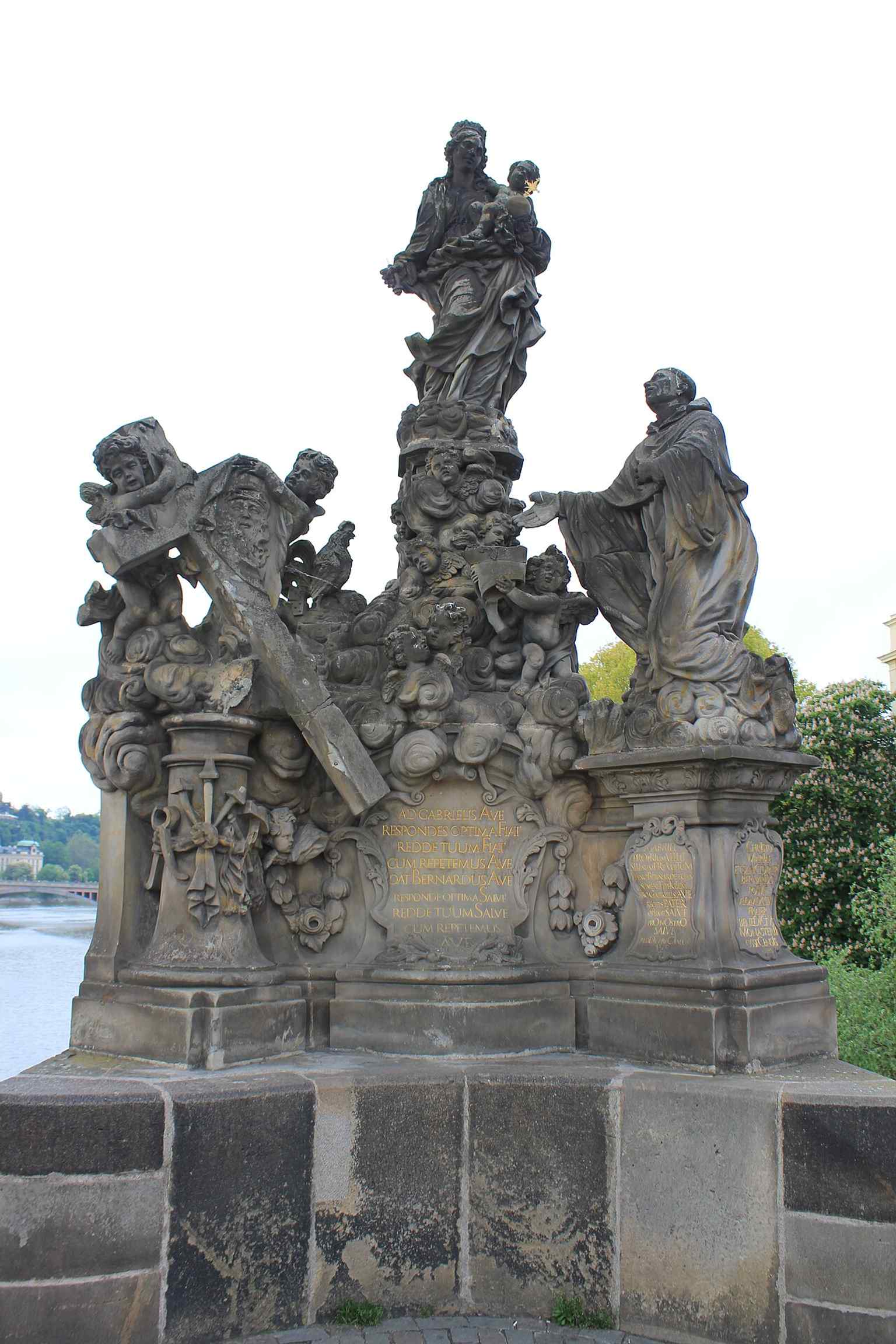An iconic view of the replica of the Madonna and Saint Bernard sculpture, part of the 'theatrum sacrum' on Charles Bridge.