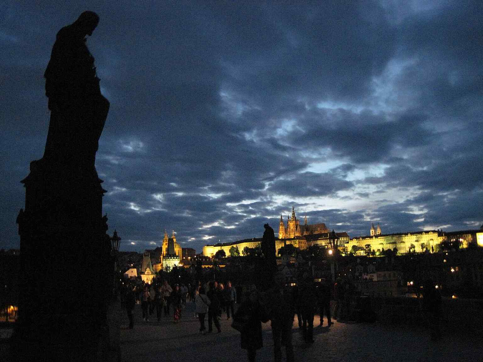 Saint Joseph is the patron saint of carpenters, making this statue on the Charles Bridge a historically significant symbol for Prague's labor community.