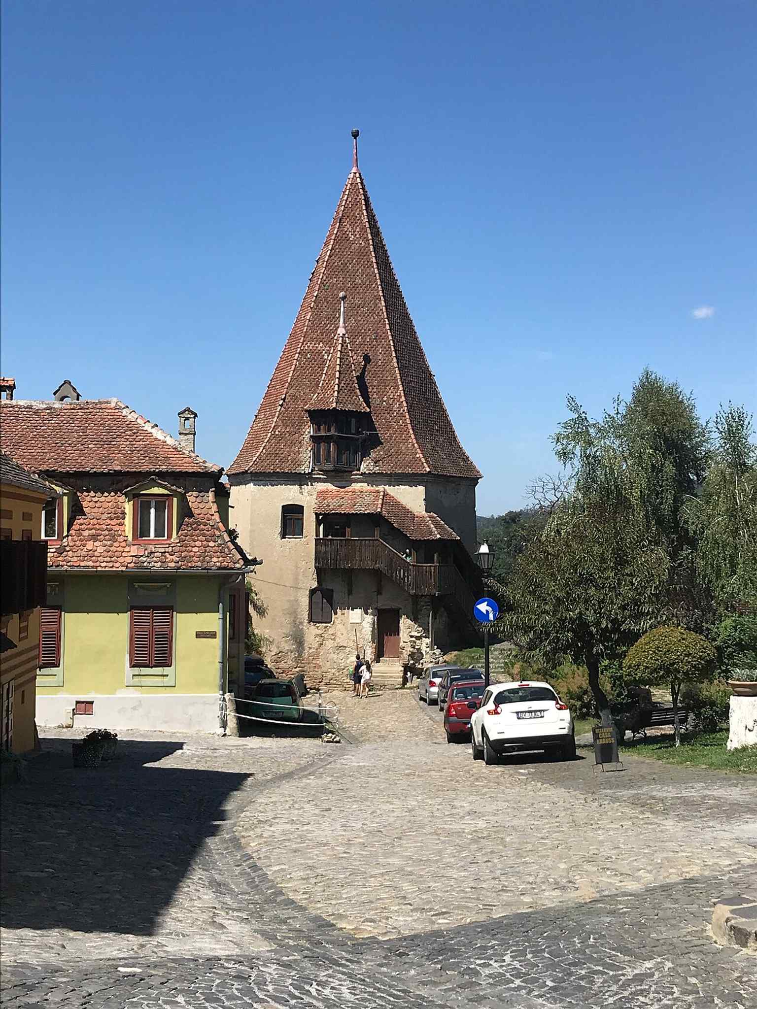 The Bootmakers' Tower today, rebuilt in 1681 in the Baroque style after the devastating fire of 1676. Its distinctive roof features two elegant observation towers, strategically placed for panoramic views of the Târnava Valley.