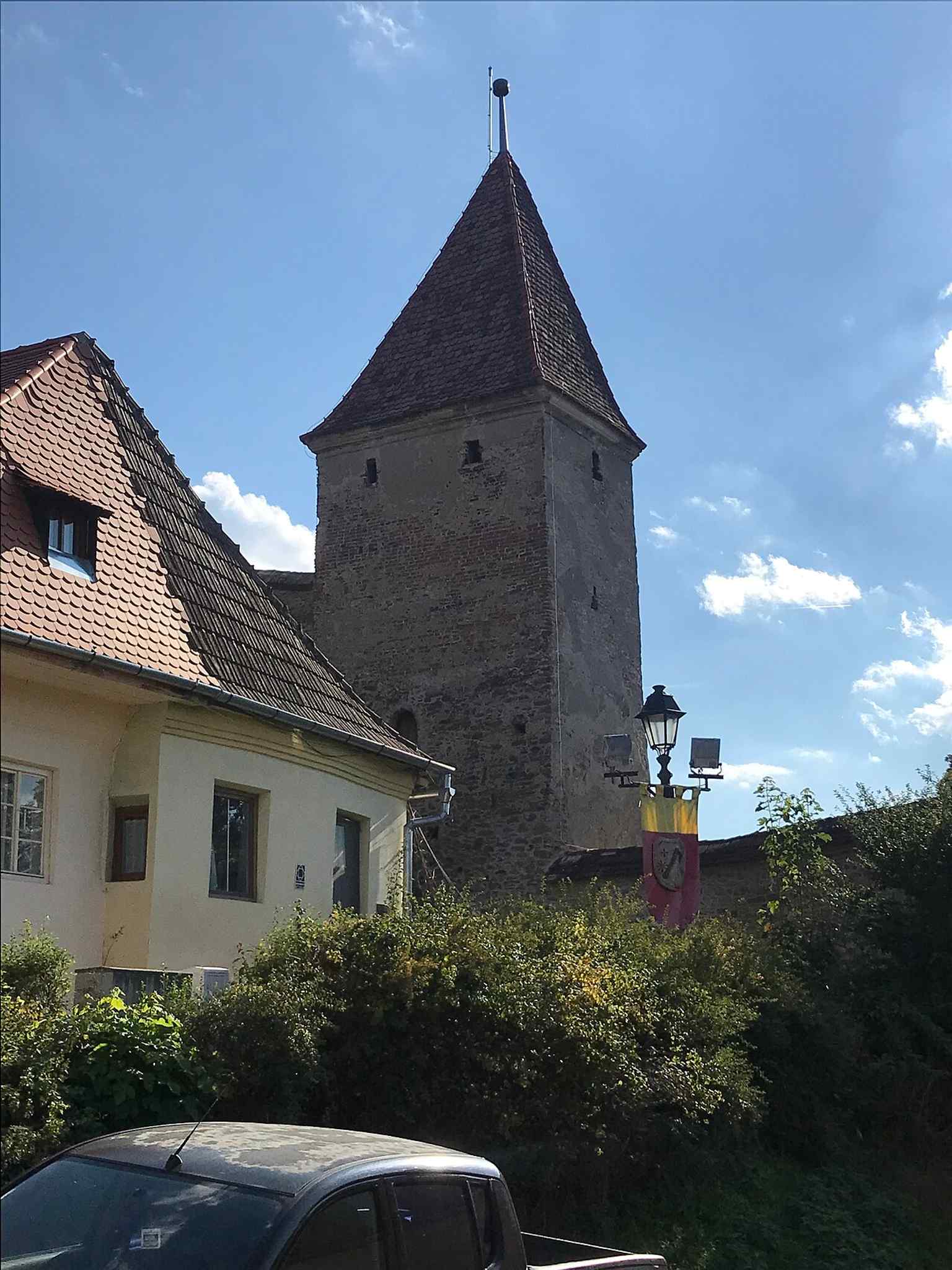 The Butchers' Tower, seen here from the east, transitioned from an eight-sided prism to its current hexagonal plan in the 16th century, a deliberate tactical upgrade.
