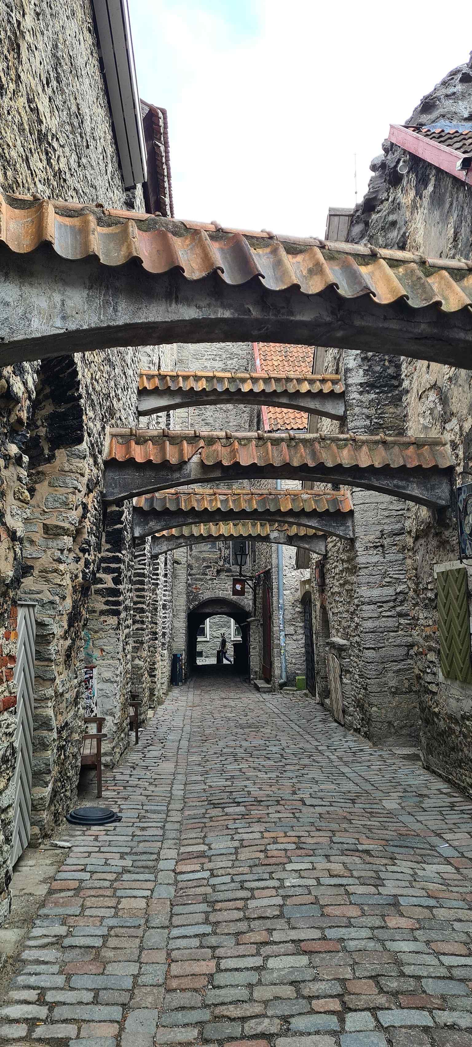 A close view of the surviving masonry and arches, reminders of the church that once stood here until the 16th-century destruction.