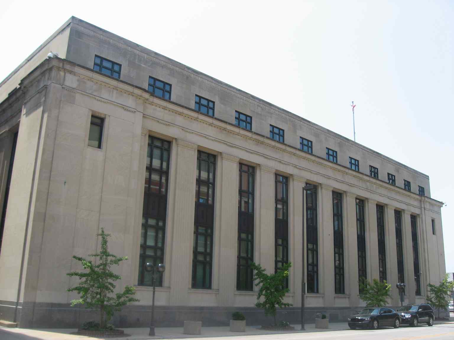 This photo shows the northern primary elevation of the Robert A. Grant Federal Building, a prominent example of Art Deco / Art Moderne architecture, built between 1932 and 1933 and faced with Indiana limestone and Vermont granite.