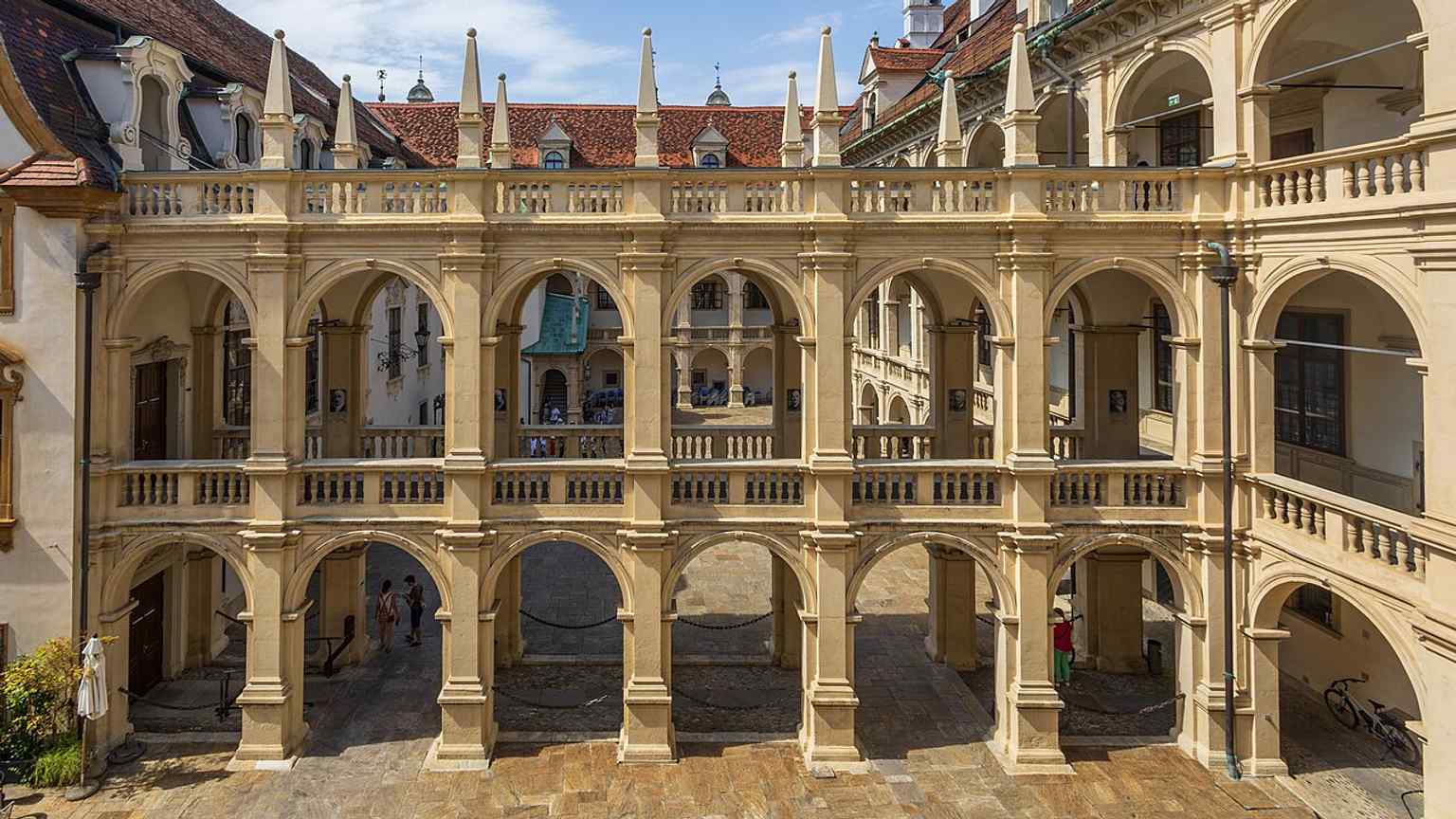 A wide city-center view with the armory, Graz Country House, and town hall side by side — a useful overview of the historic Herrengasse ensemble.