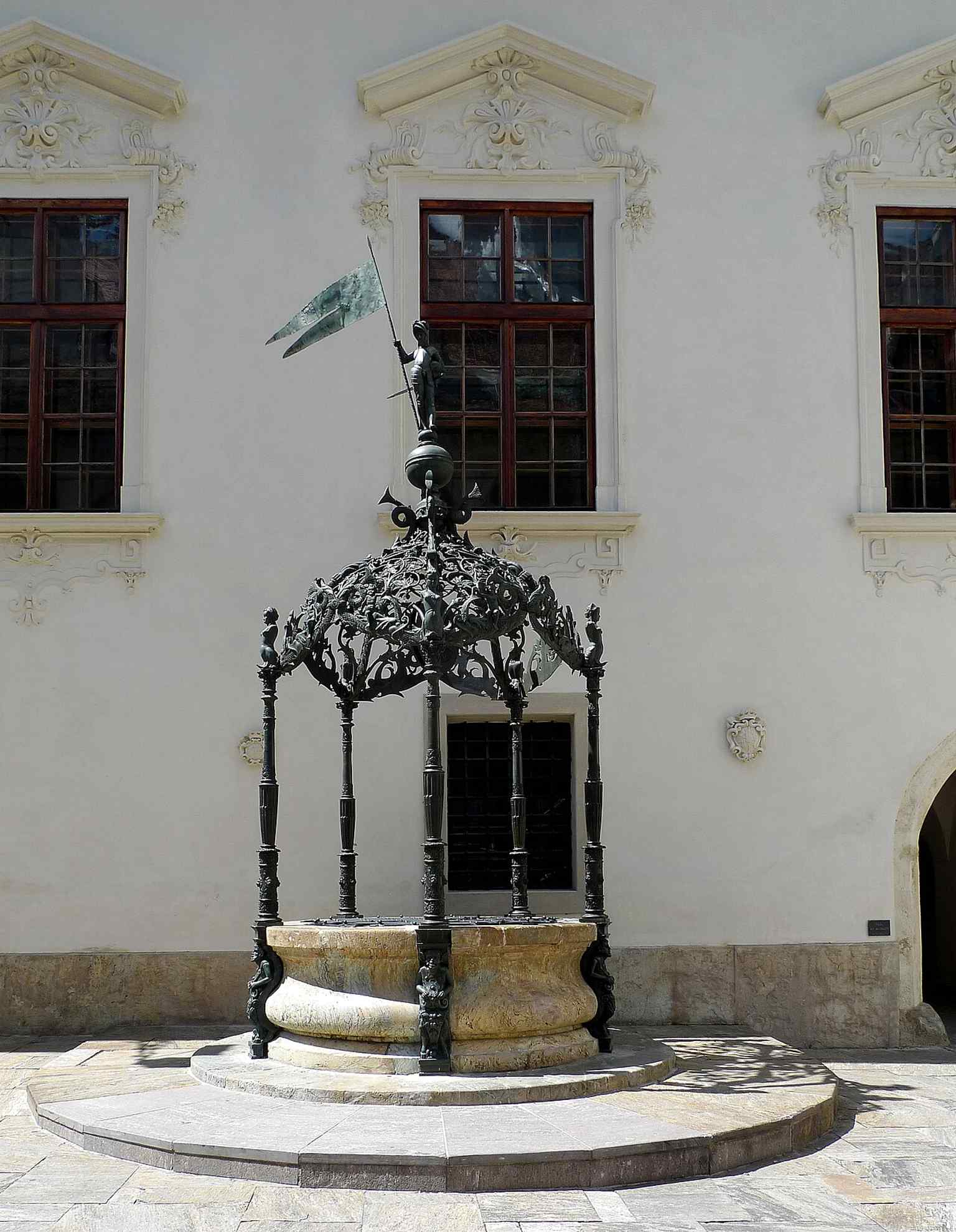 The Landhaus fountain in the courtyard — one of the notable bronze works in Graz, linked in the source text to a 1590 mannerist design.
