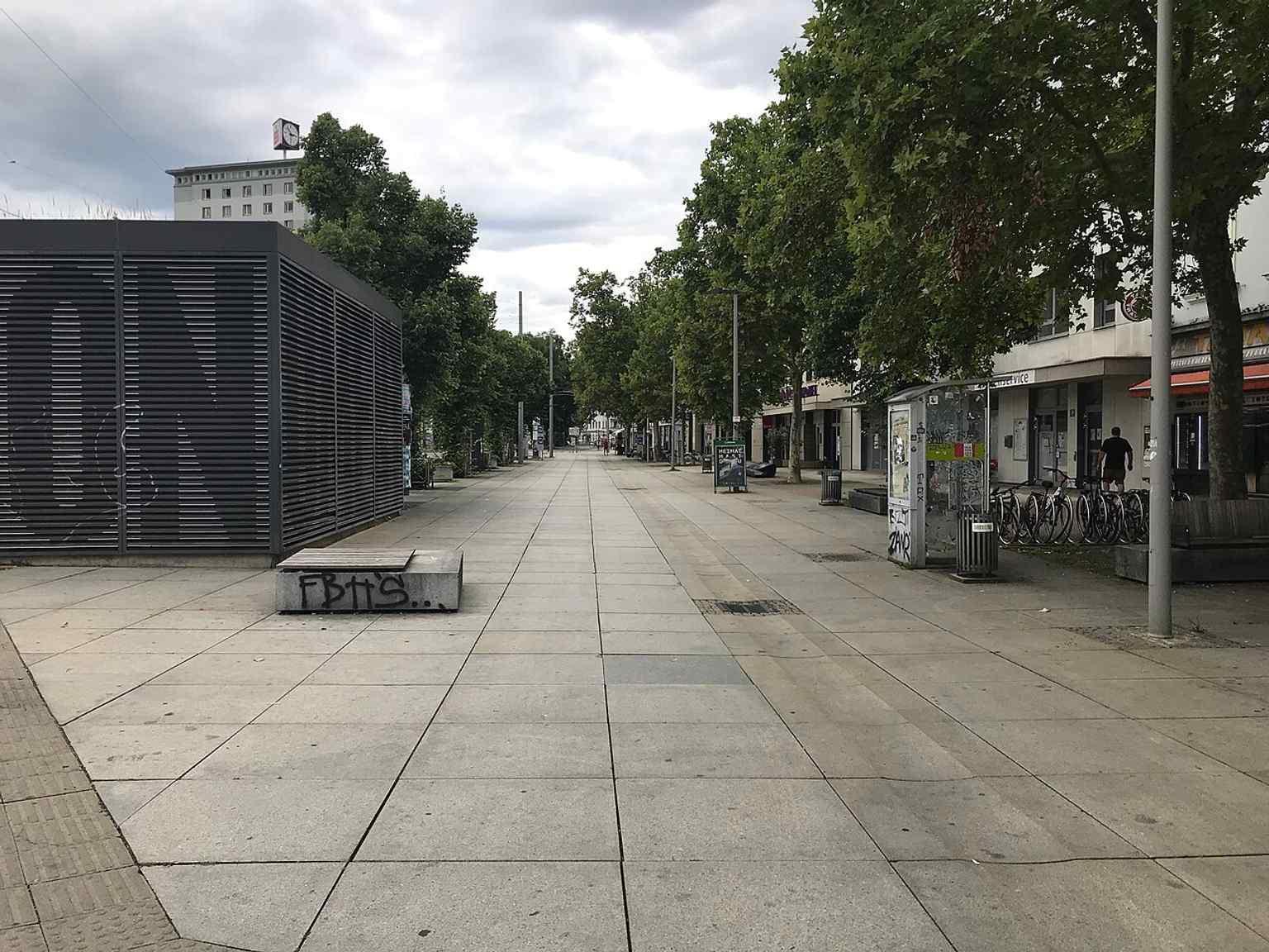 The busier northern half of Lendplatz, showing how the plaza is split by Keplerstraße and used as a transport corridor.