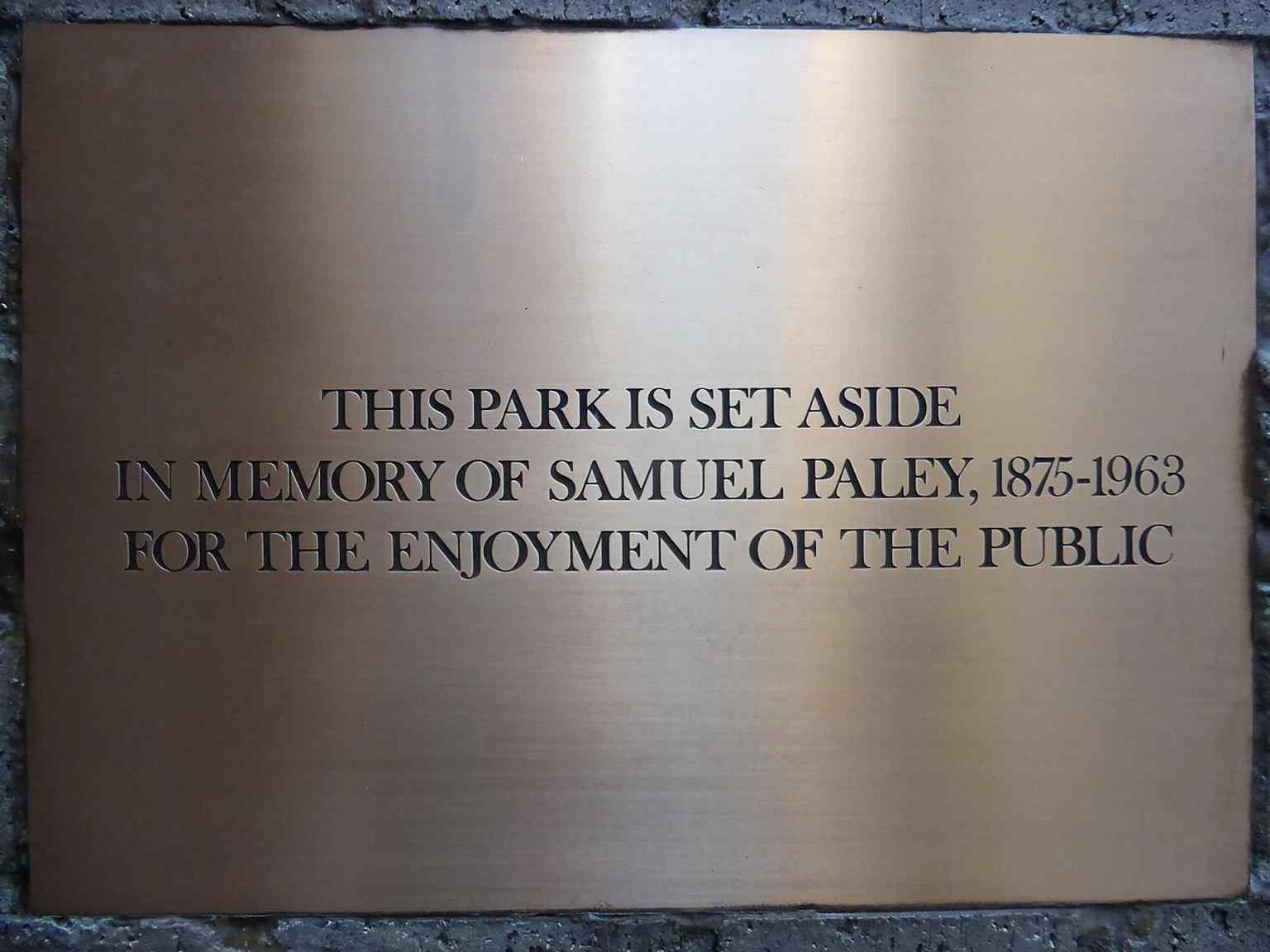 The dedication plaque that memorializes Samuel Paley and marks the park as a privately owned public space.
