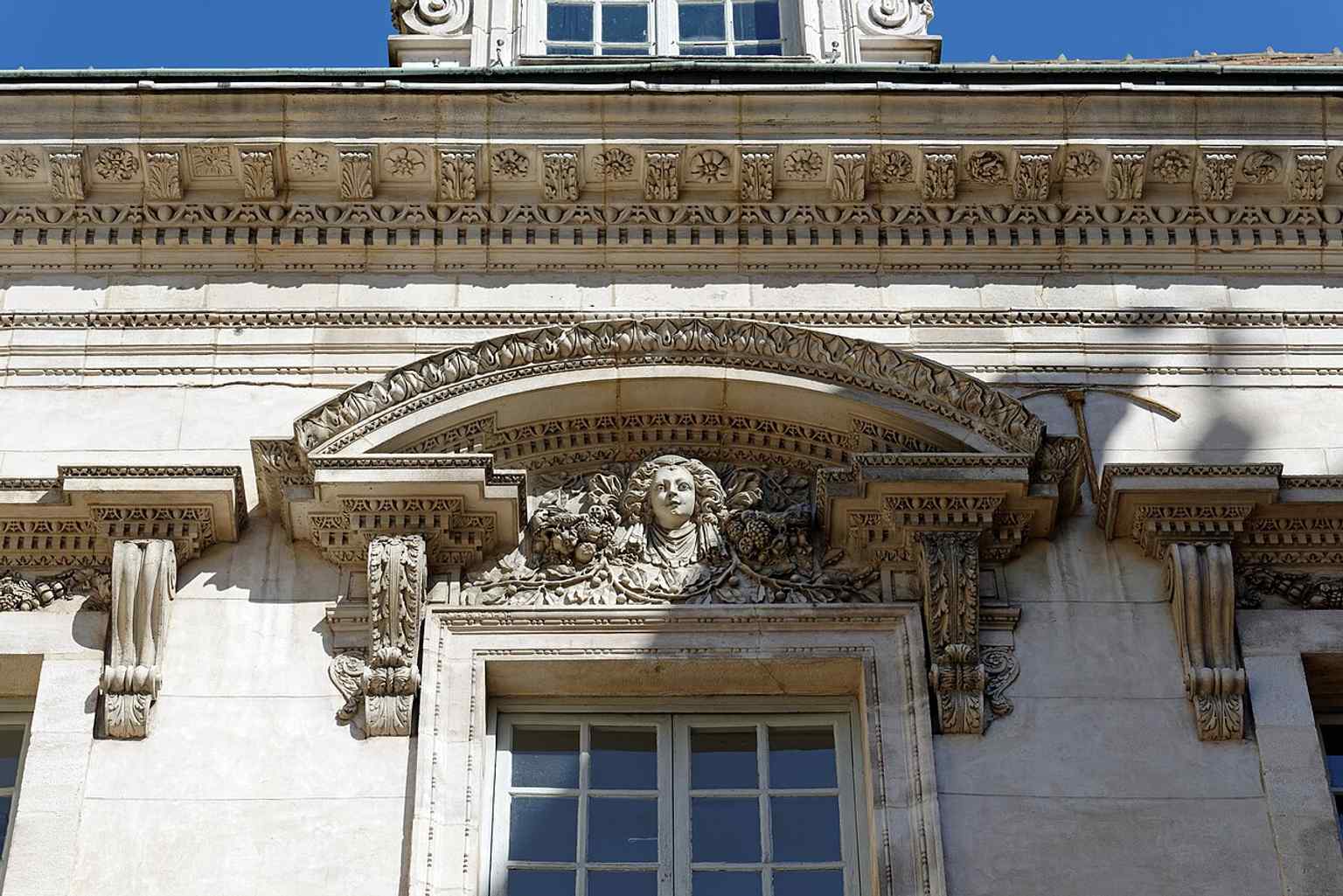 This elegant exterior view showcases the Hôtel de Vogüé, a grand private mansion known as a prototype of Dijon's parliamentary hotels.