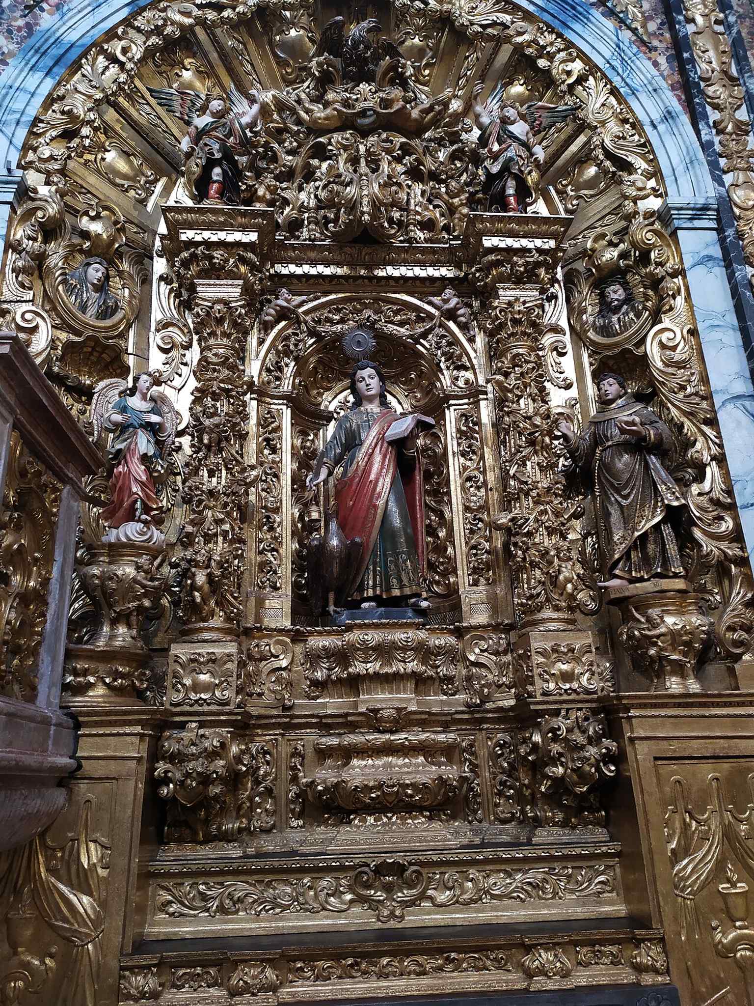 Another interior view that helps show the church as a single integrated space of worship, decoration, and devotional artwork.