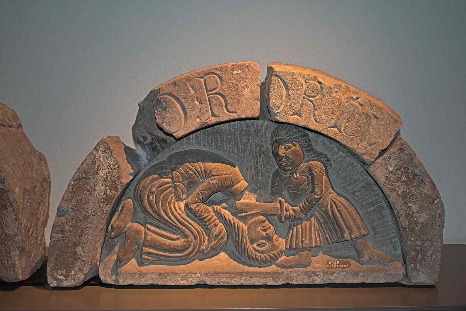 The Beheading of Saint John the Baptist — a Romanesque stone relief that fits the museum’s strong medieval art and archaeology collections.