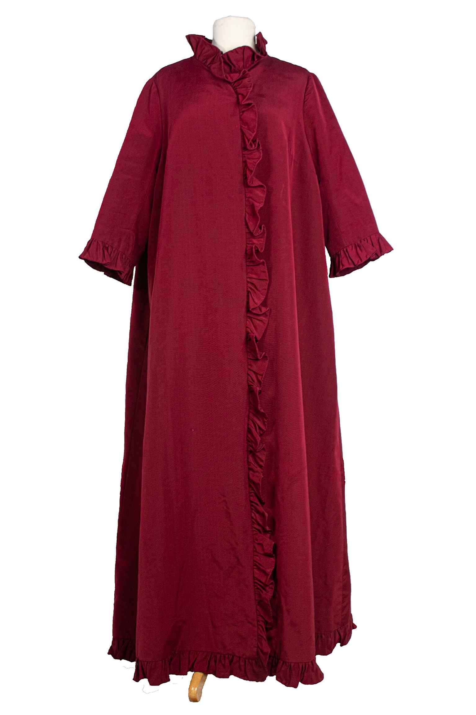 This 'Red Evening Gown' by Irish designer Sybil Connolly is part of her collection, including dresses like the 'Pink Ice Dress', largely donated by Gertrude Hunt.