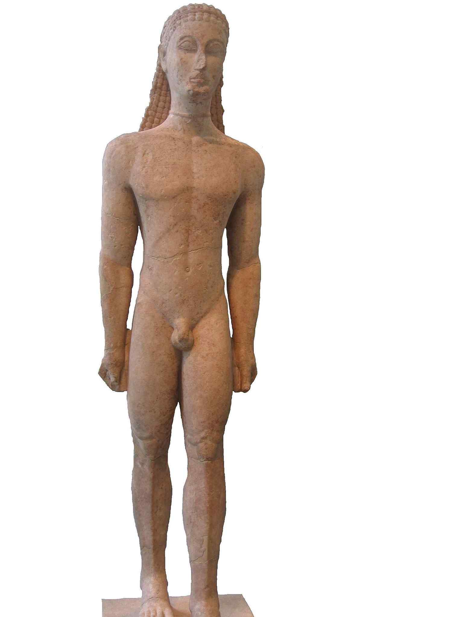 The full marble kouros at The Met, showing the rigid forward-facing stance and left foot advanced that echo Egyptian statuary.