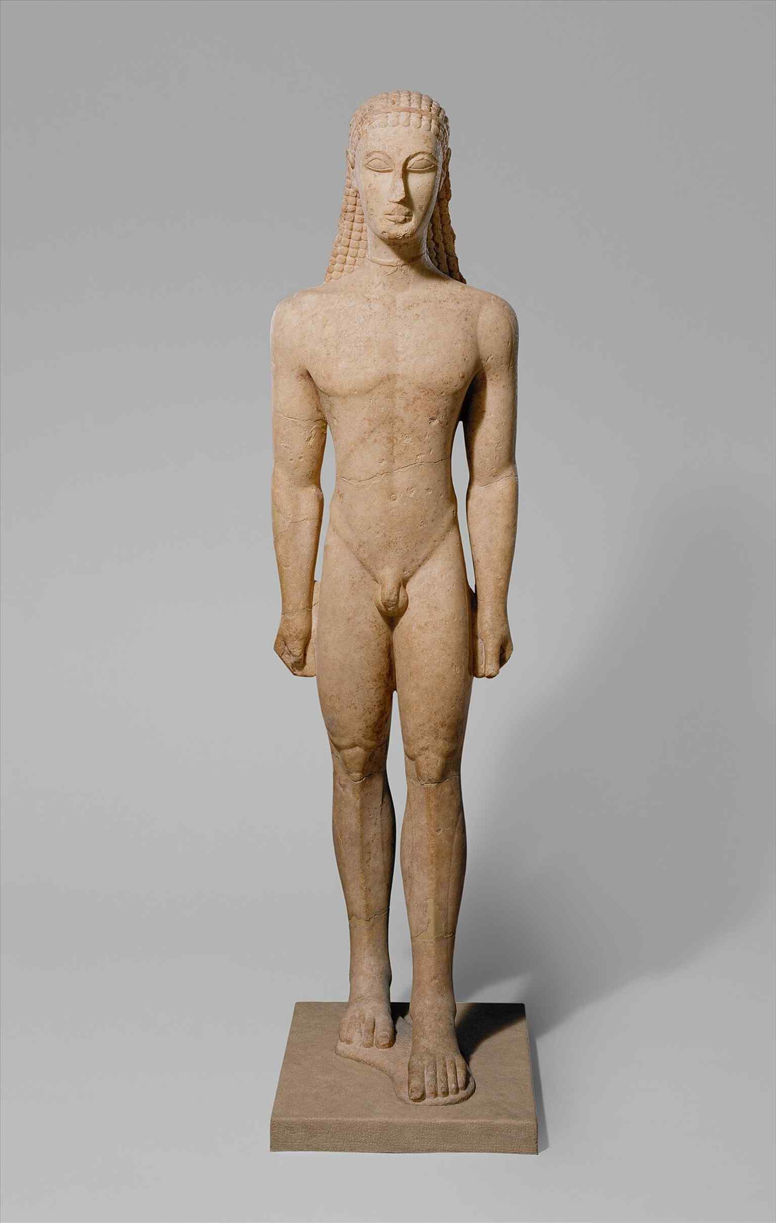 Another full-height view of the New York Kouros, useful for seeing how the figure served as an elite grave marker rather than a realistic portrait.