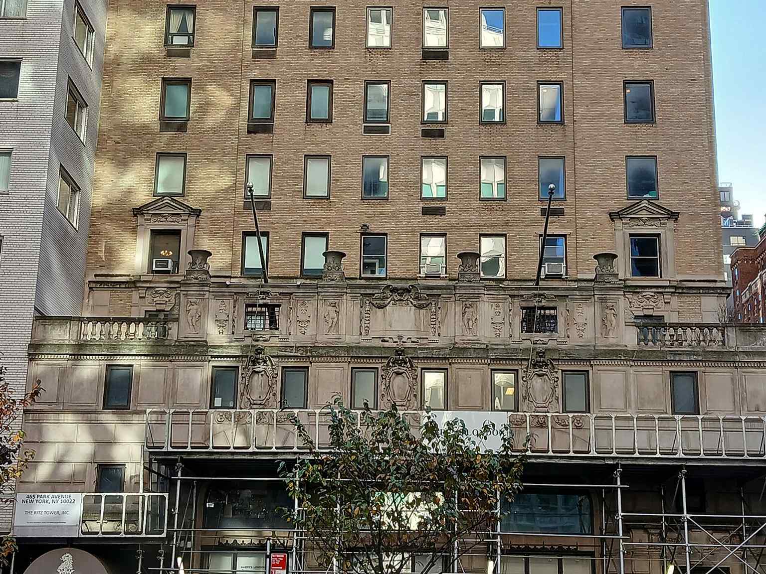 A direct 2025 view of the Ritz Tower, highlighting the building’s narrow vertical massing and stepped upper stories.