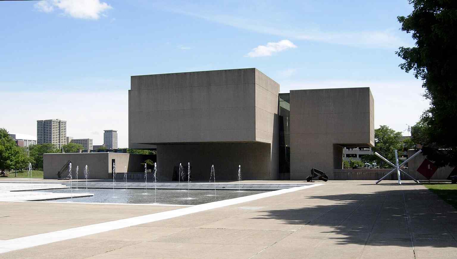 The rear of the Everson Museum shows I. M. Pei’s sculptural modernist form, built as a landmark-worthy work of art in itself.