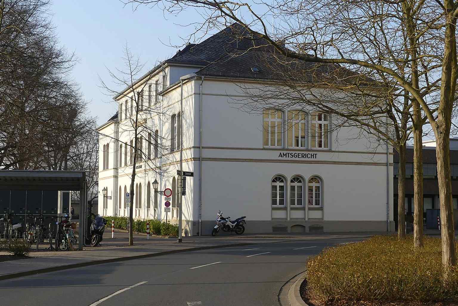 The modern Zehnthof courthouse with its tall stair tower — the 1977 replacement building that later received a solar installation in 2004.