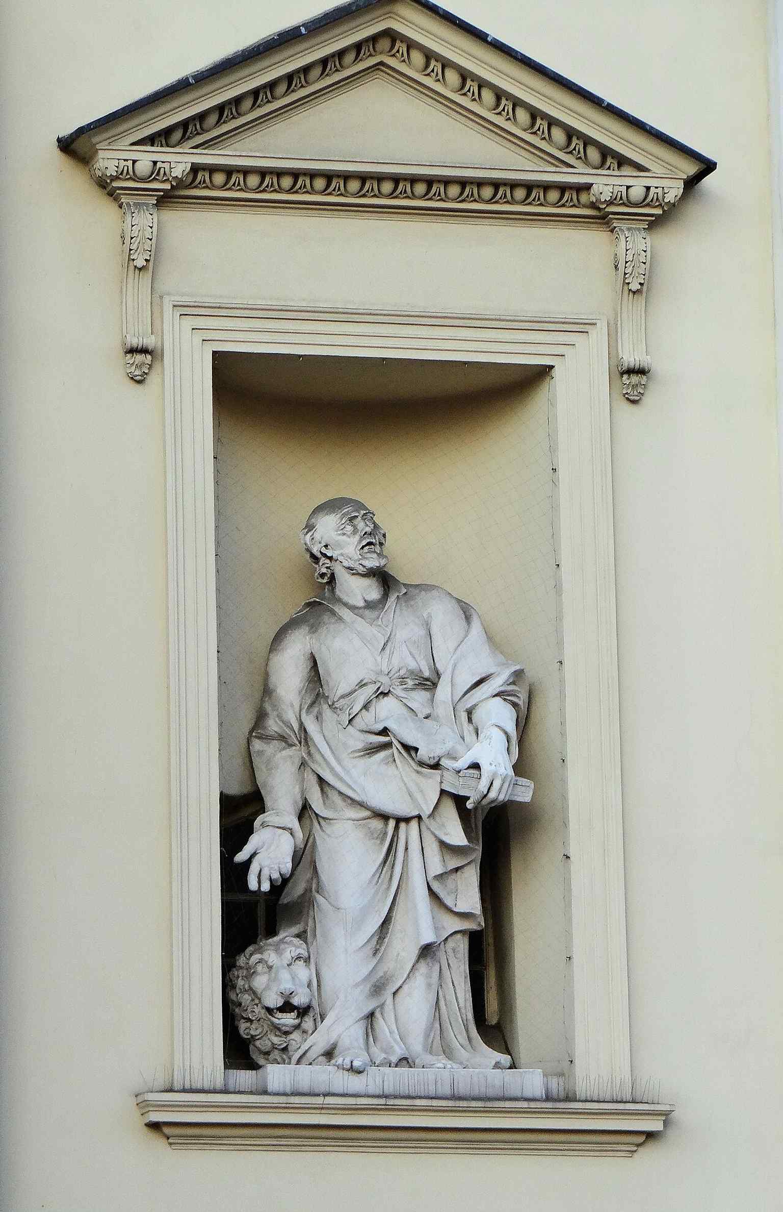 A high-resolution detail of the church’s exterior ornament, ideal for showing the rich stone carving added during later renovations.