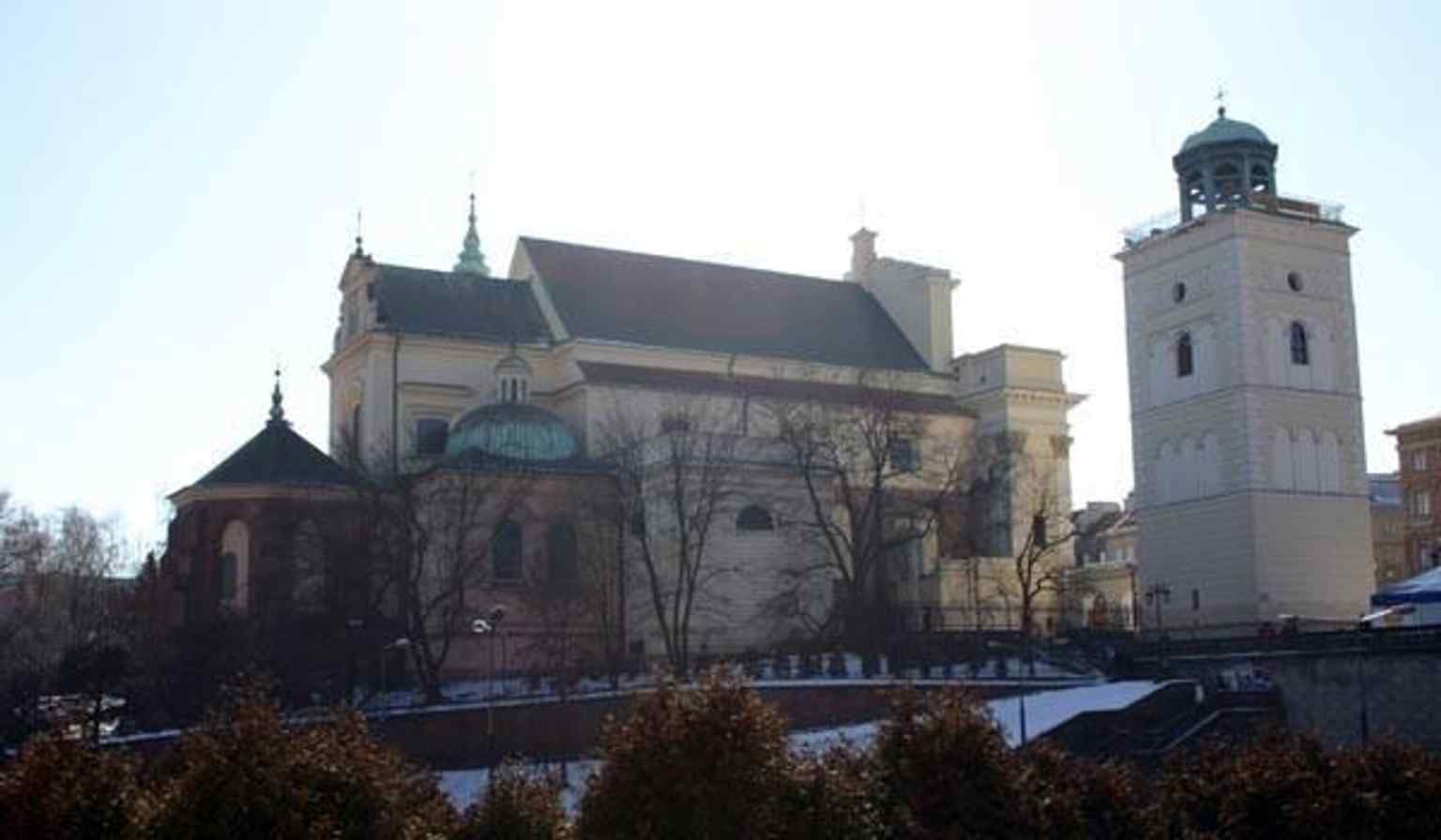 A clear modern view of the church exterior, highlighting the classicist façade added in the late 18th century by Piotr Aigner.