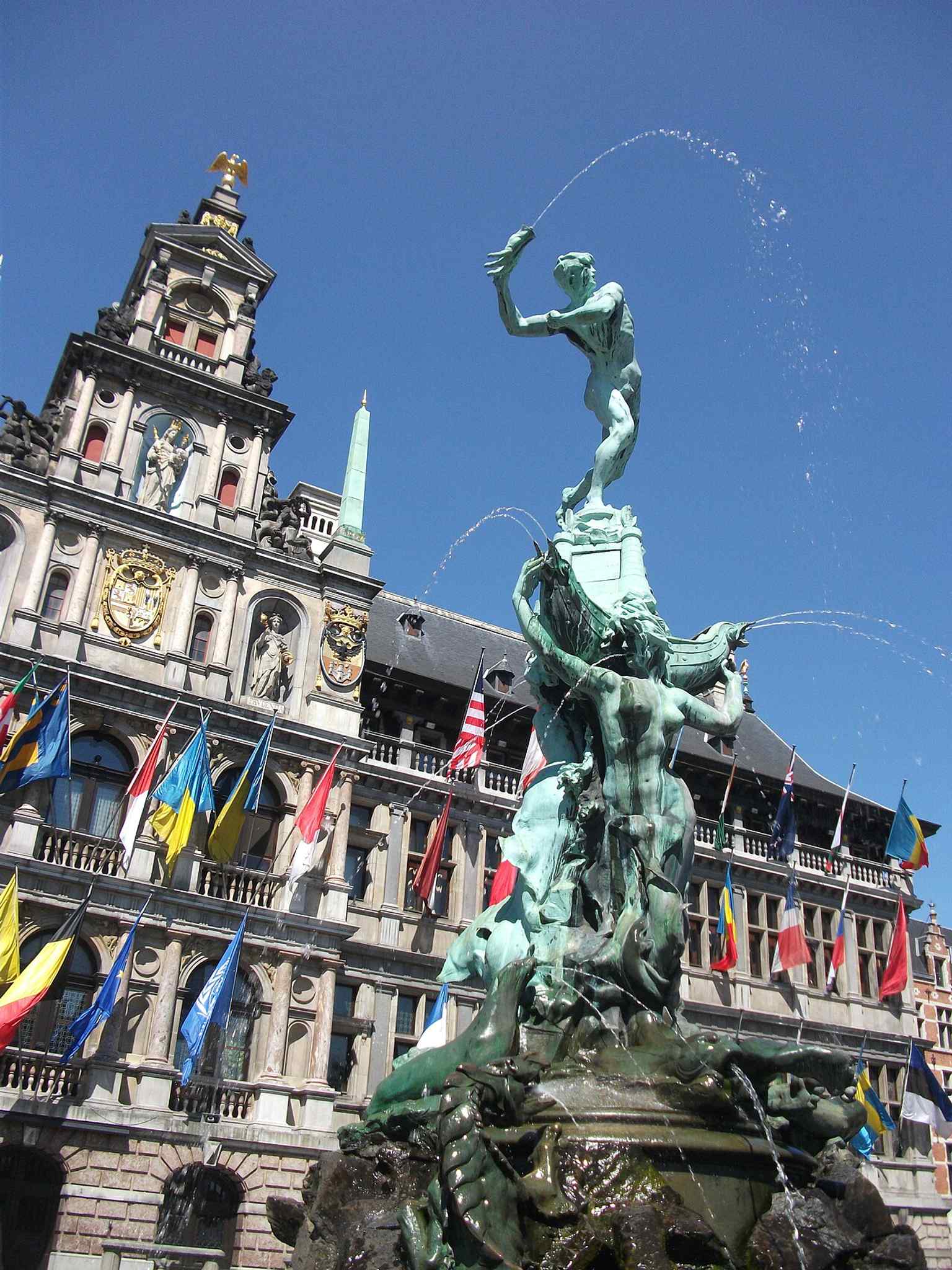 The fountain with the Stadhuis behind it—an iconic composition on the Grote Markt where Brabo throws the giant’s hand toward the city.