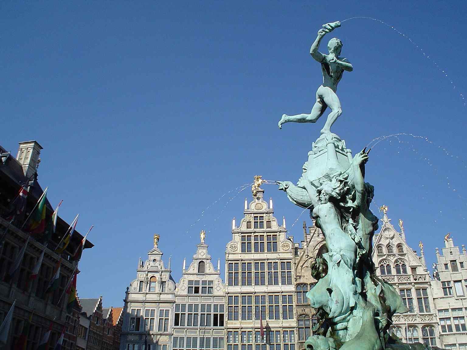 This detailed view shows the full sculptural story: mermaids, sea creatures, the fallen giant, and Brabo above them.