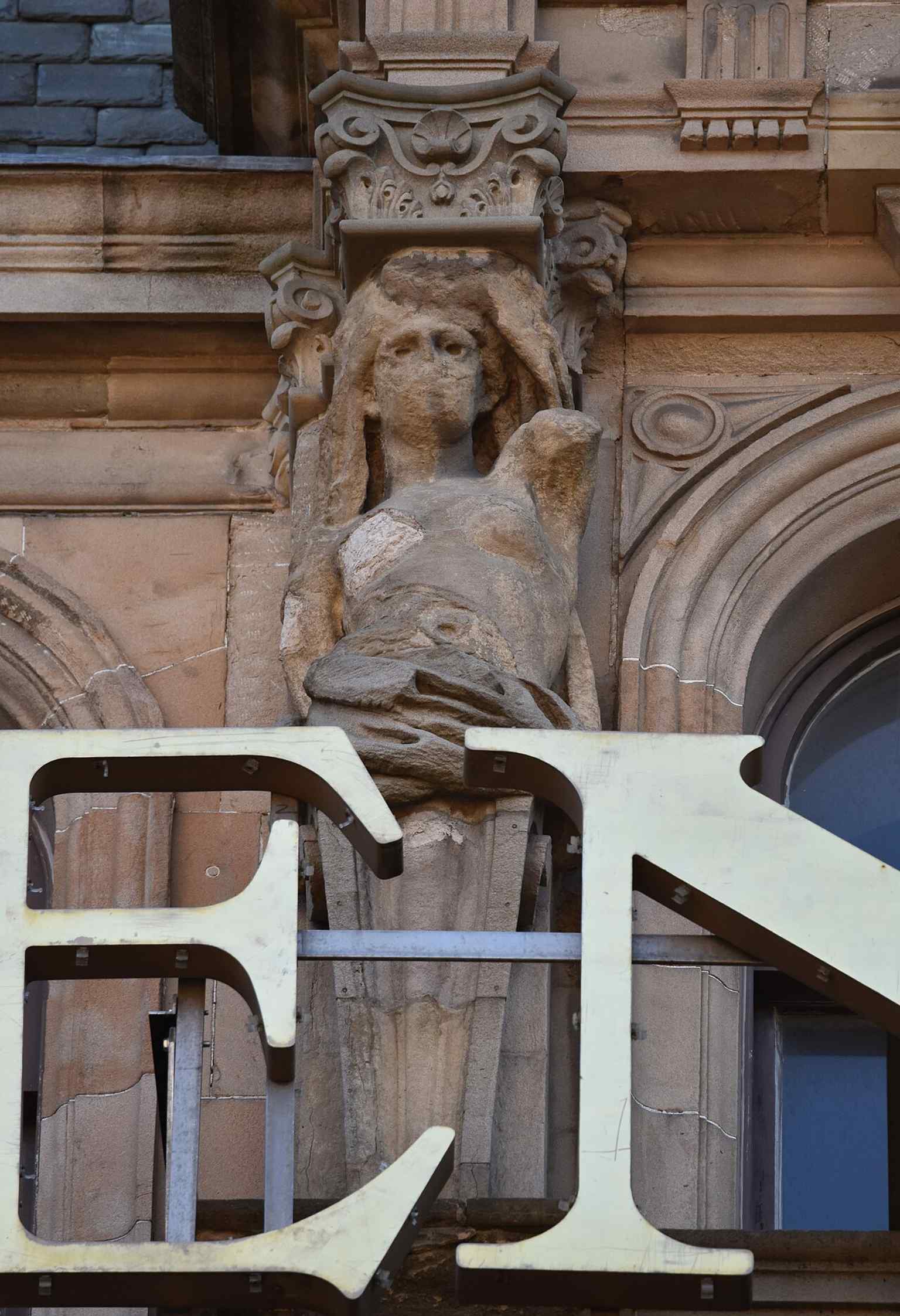 Caryatids on the South St David Street side highlight the store’s elaborate Renaissance Revival stonework.