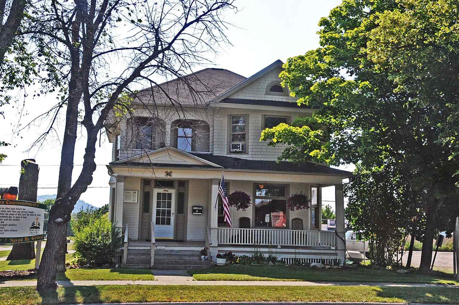 The main Queen Anne house on 5th Avenue West, built by carpenter Elmer Bader in 1903 as part of his home-building and rental business.
