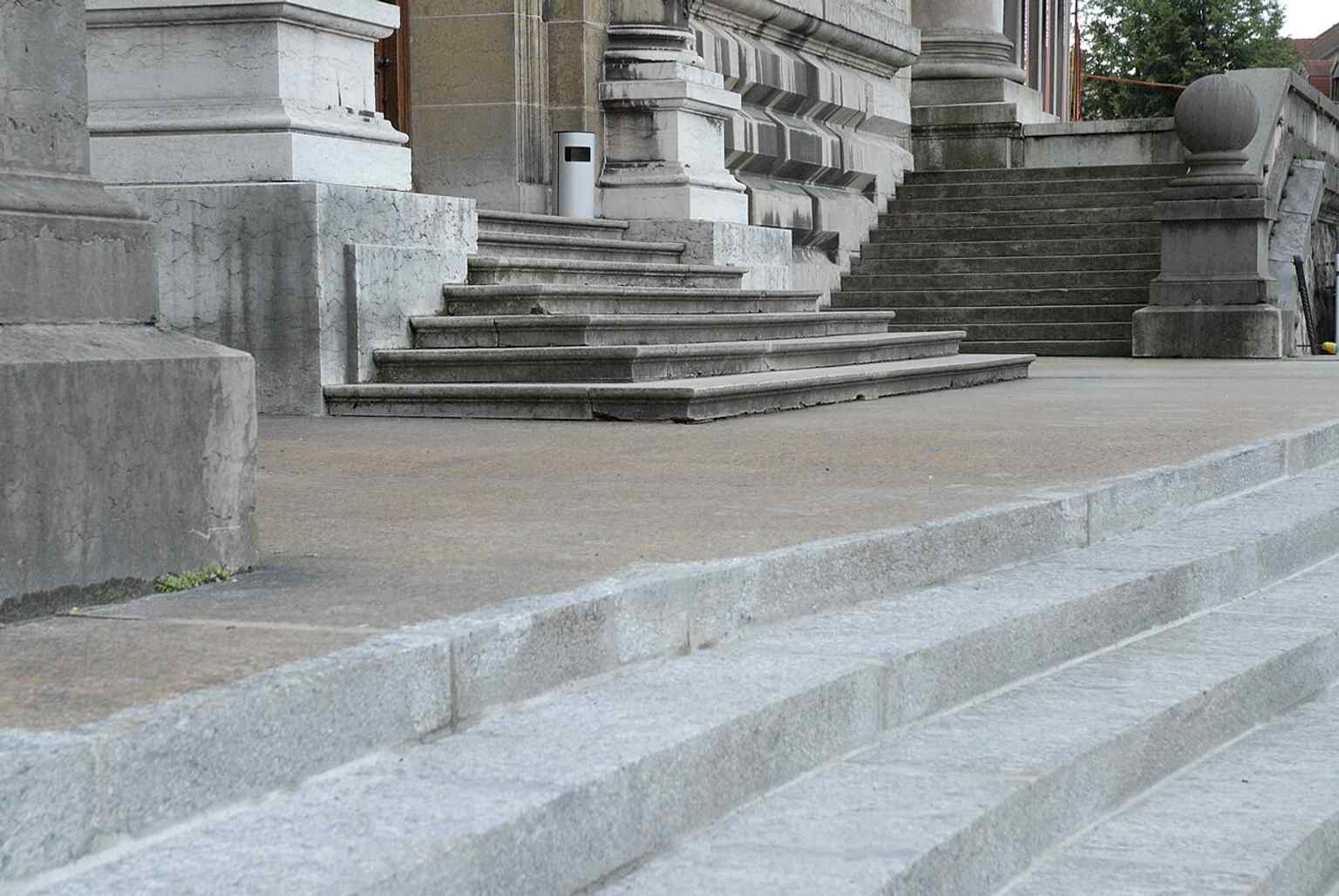 Exterior stair details at Palais de Rumine, a useful close look at the monumental approach to the building on Place de la Riponne.