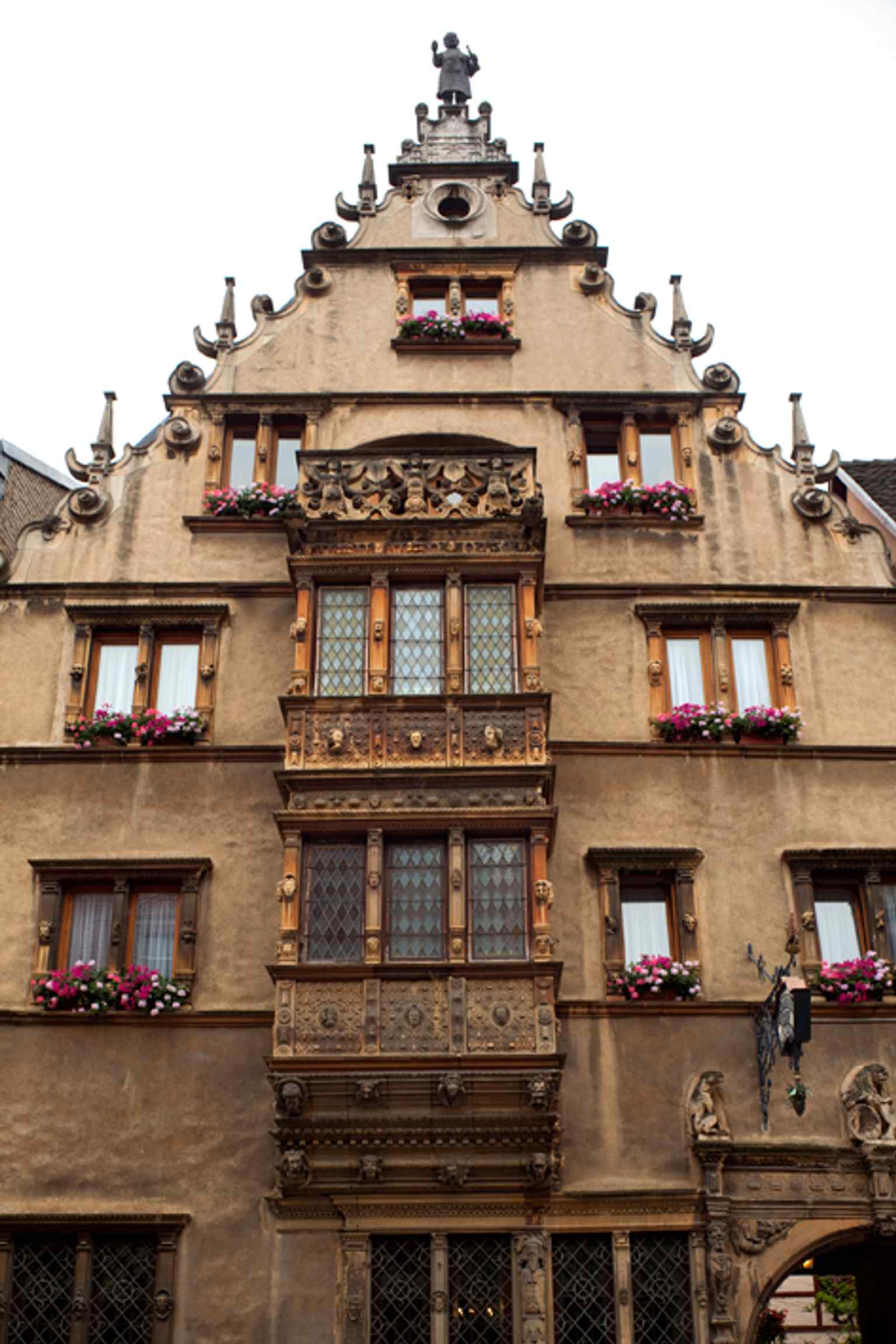 The striking Renaissance facade of the House of Heads, capturing the grand architectural vision of Anton Burger in 2010.