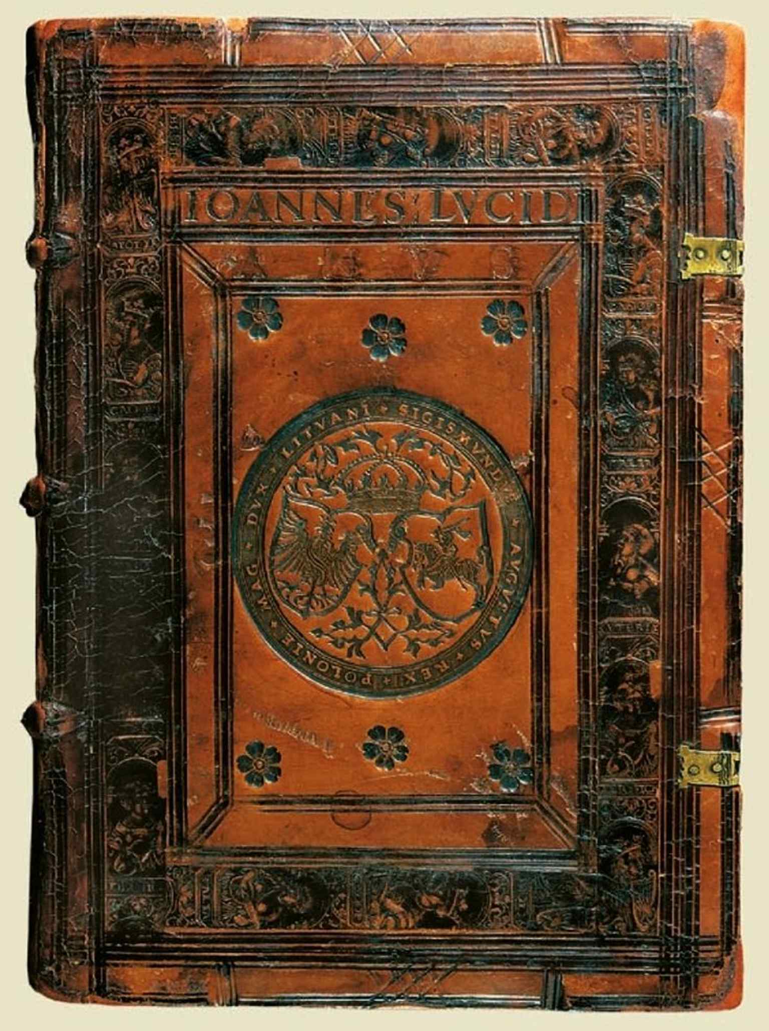 A book cover from Sigismund II Augustus’s former library, evoking the palace’s reputation as a center of learning and court culture.