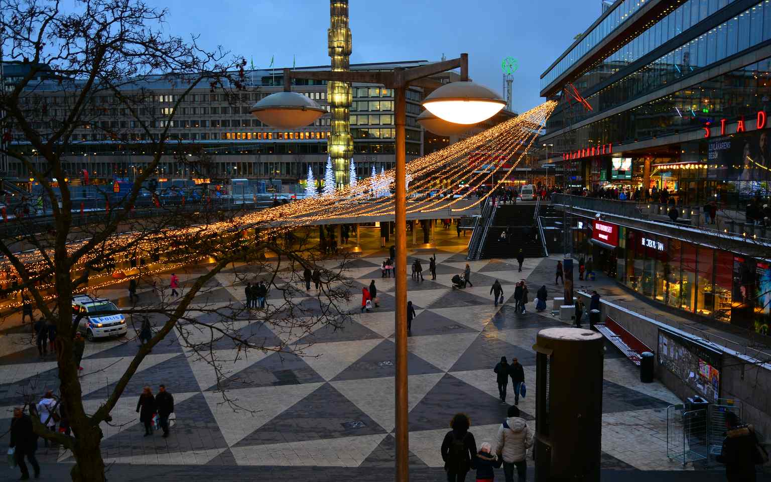 Sergels torg adorned with festive Christmas lights, highlighting the square's seasonal transformation into a magical public space during winter.