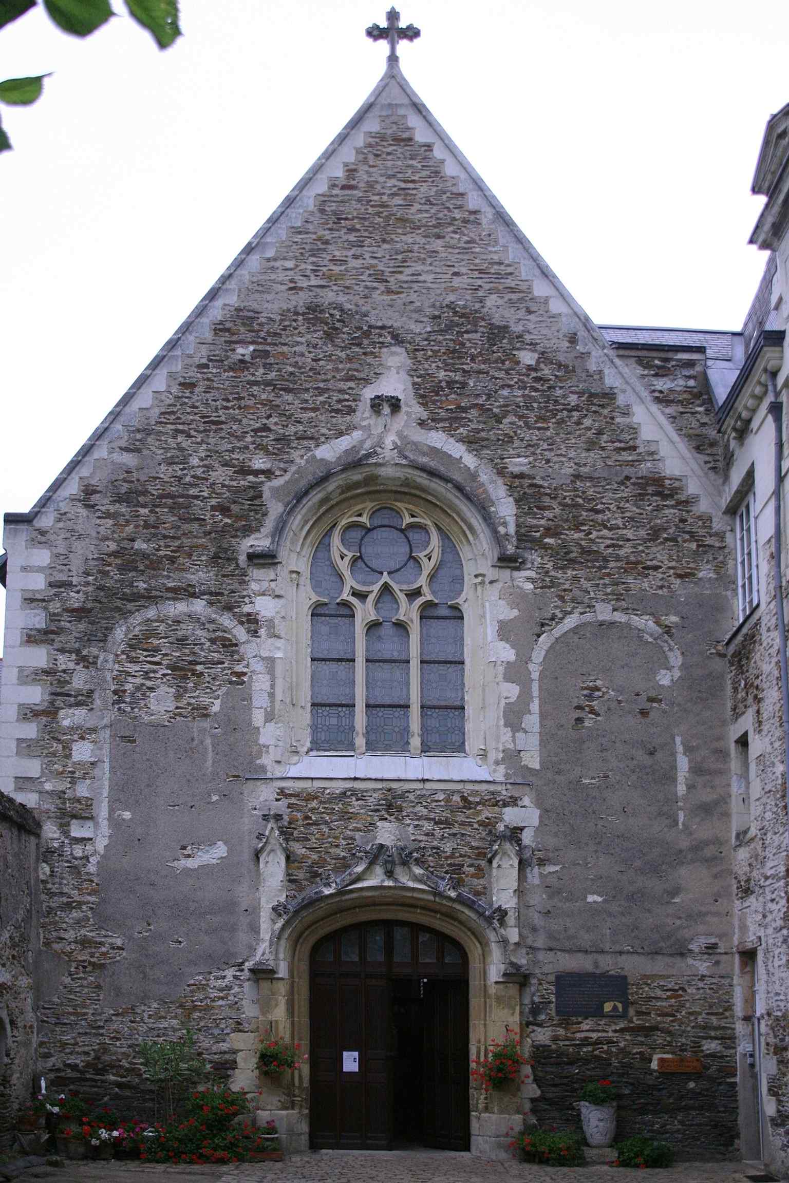 This exterior view shows the church whose cornerstone was laid on April 25, 1620, by Prince Pierre de Rohan and his wife Antoinette, marking the beginning of its construction.