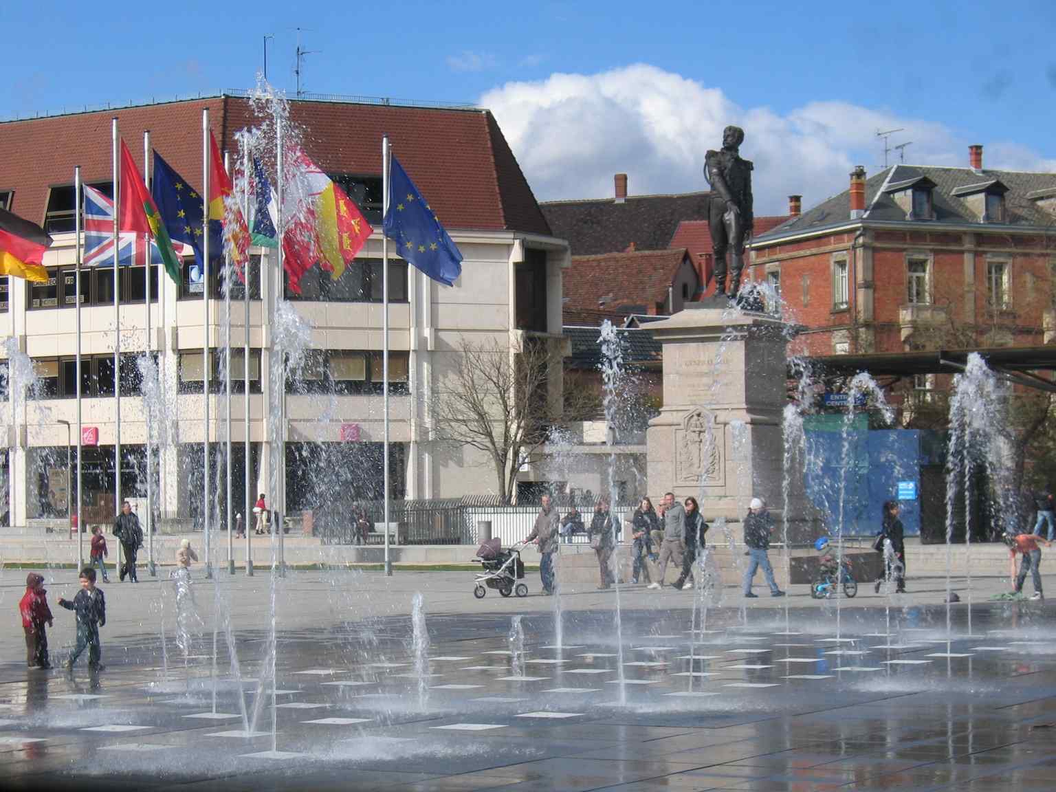 The vibrant Place Rapp as it stands today, a welcoming public square surrounding the historic monument (2010).