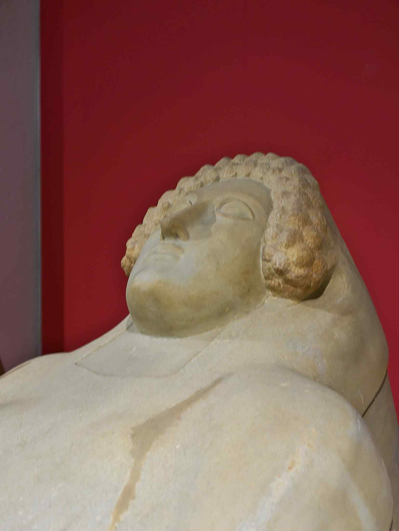 The celebrated “Dama de Cádiz” head from a Phoenician anthropoid sarcophagus, one of the museum’s signature archaeological treasures.