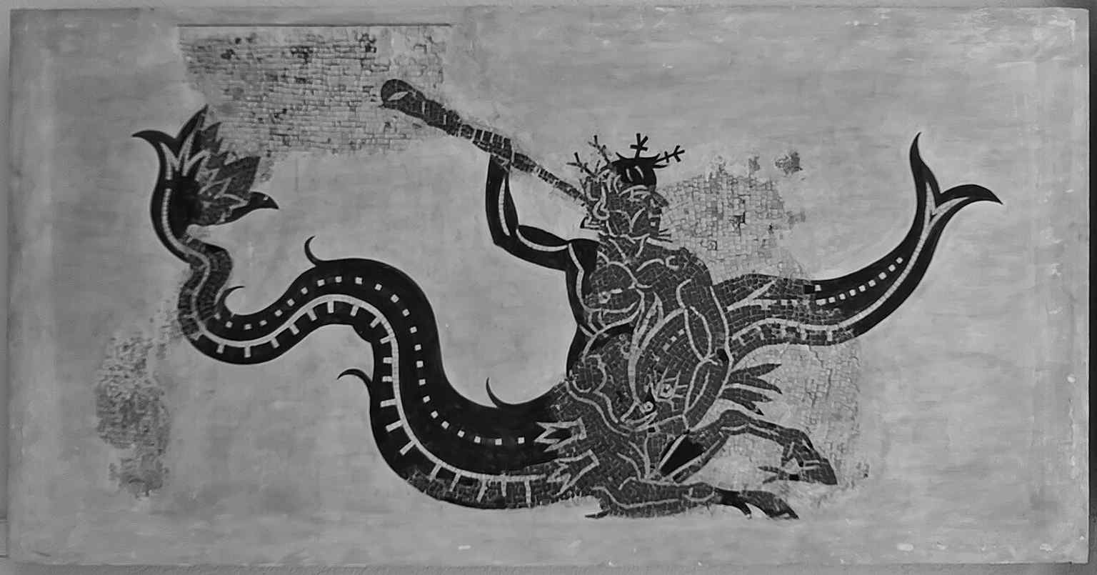 A Roman triton-and-dolphin mosaic from Paterna de Rivera, a striking example of the mosaics preserved in the archaeological section.