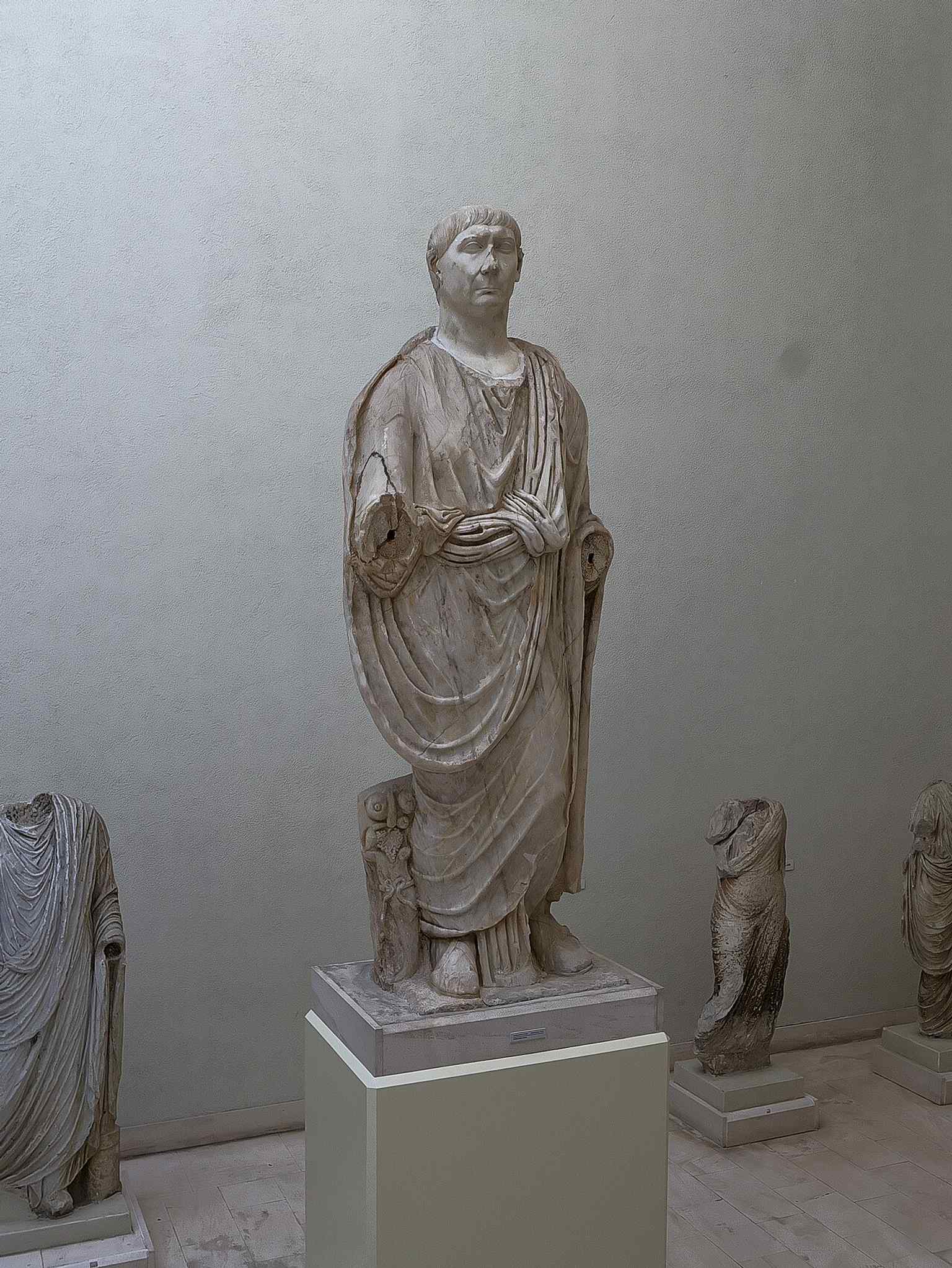 The colossal statue of Trajan, assembled from reused marble pieces and brought from Baelo Claudia.