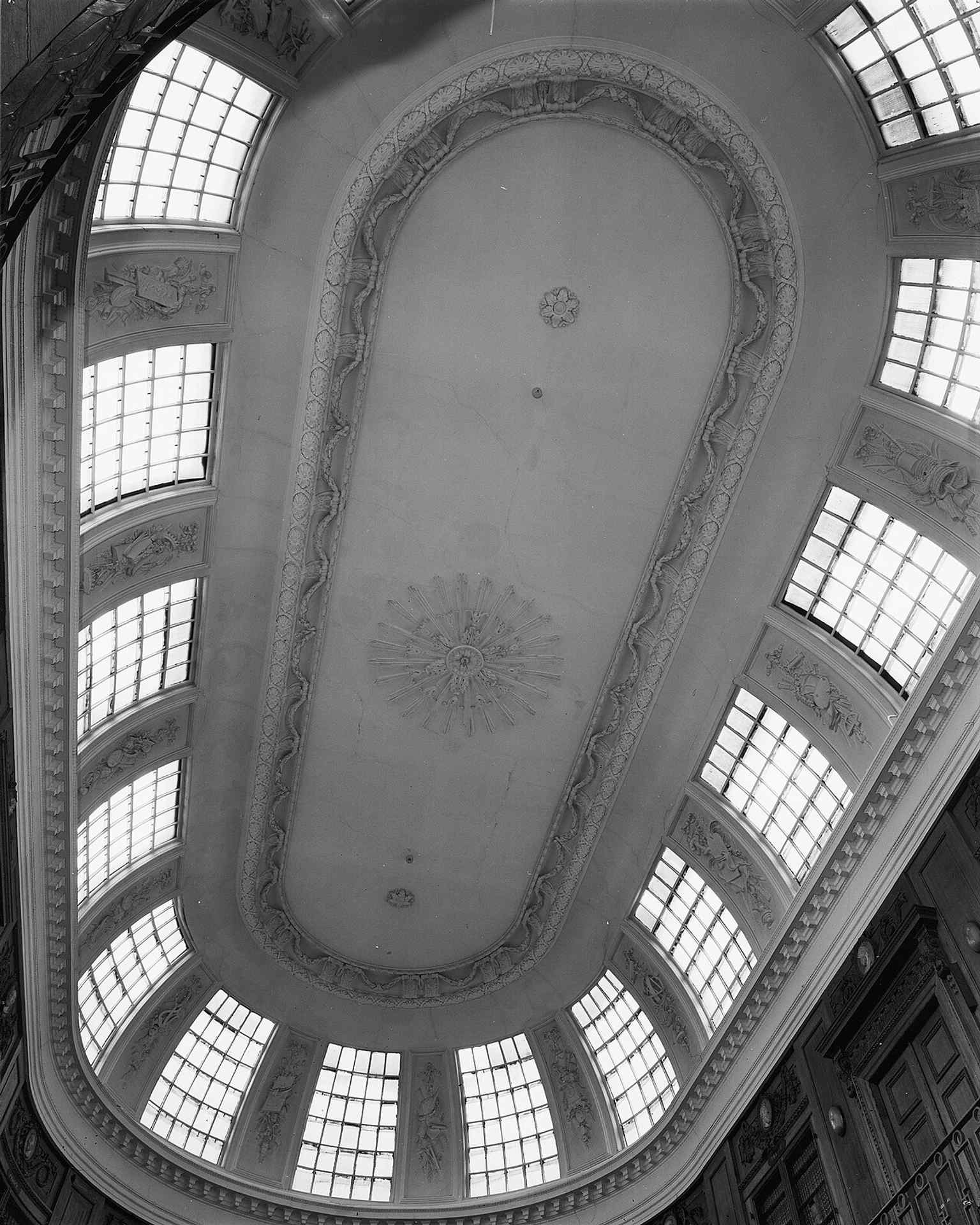 The Oval Room’s skylight and stucco ceiling — a striking architectural feature that floods the historic hall with natural light.