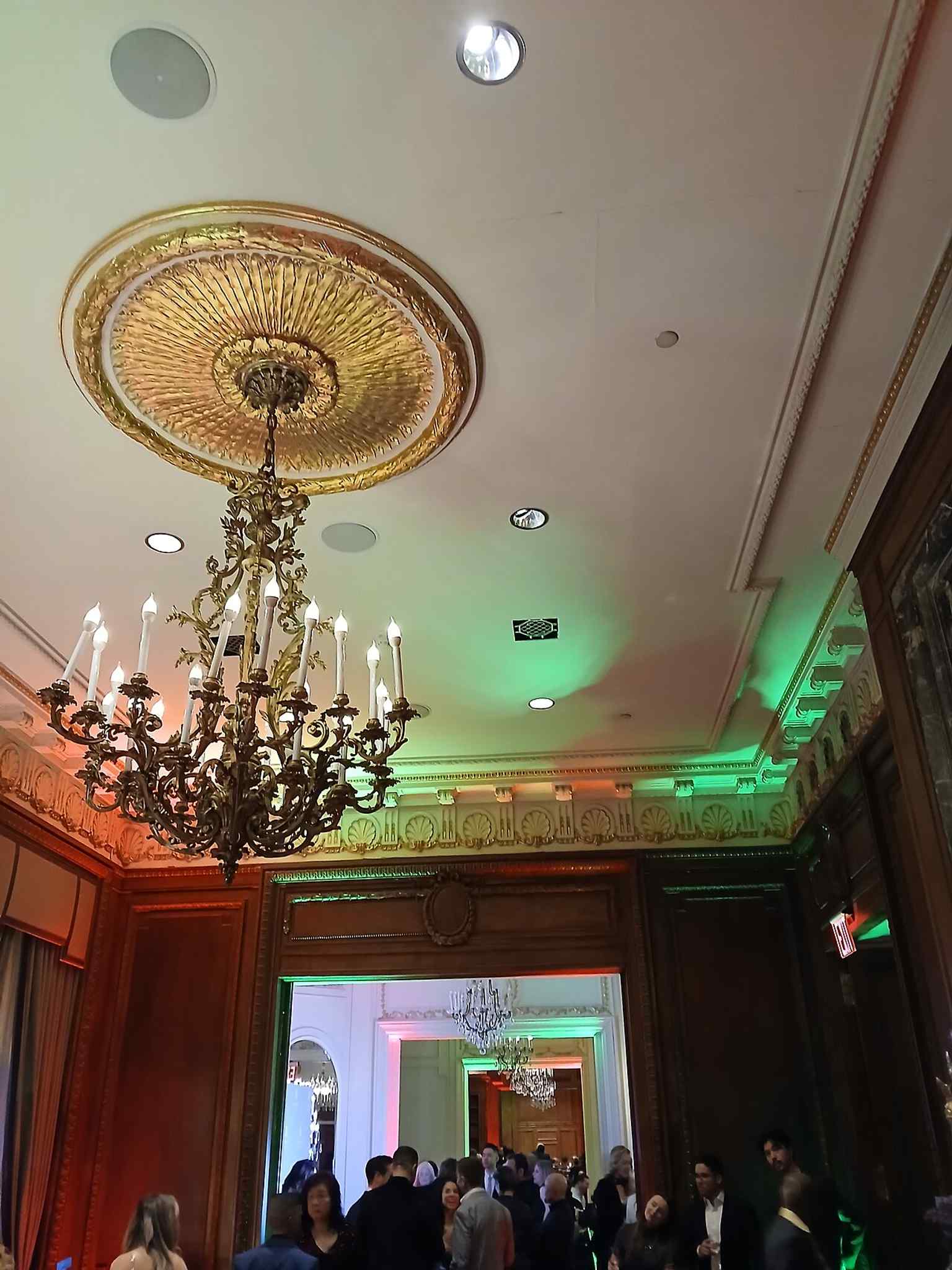 A second-floor reception room shows the elegant suite of public rooms that once included ballroom, banquet hall, and private dining spaces.