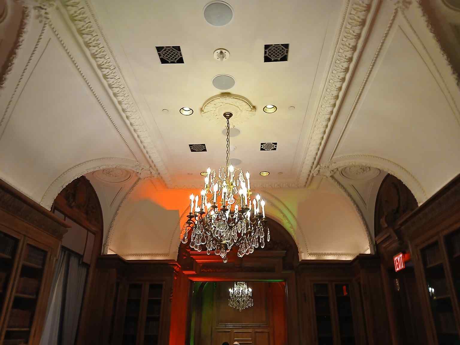 The second-floor library ties to the St. Regis’s literary side, where guests once browsed a carefully curated book collection.