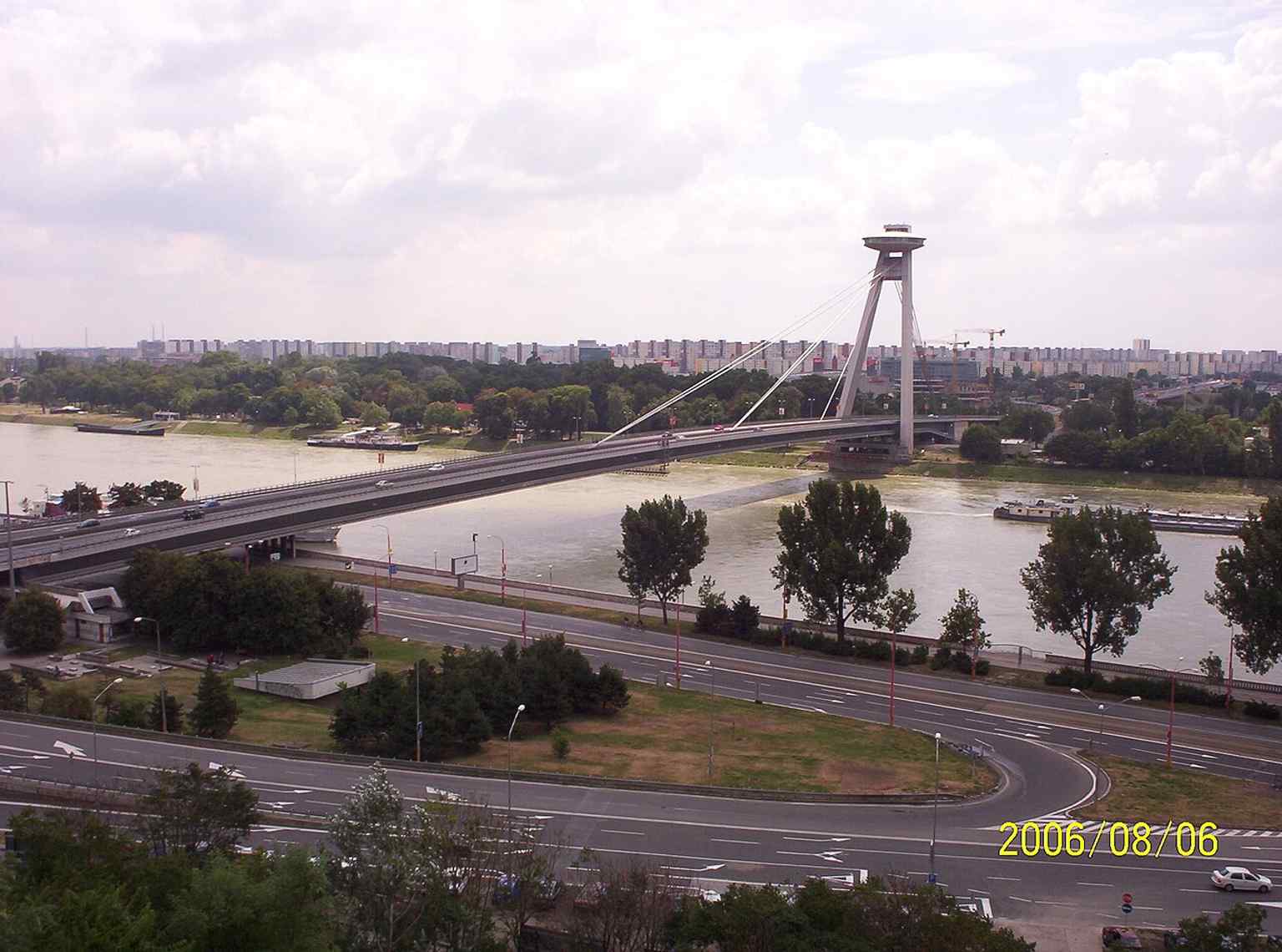 A clear daylight view of the bridge in 2006, useful for showing the striking asymmetrical silhouette that defines Bratislava’s skyline.